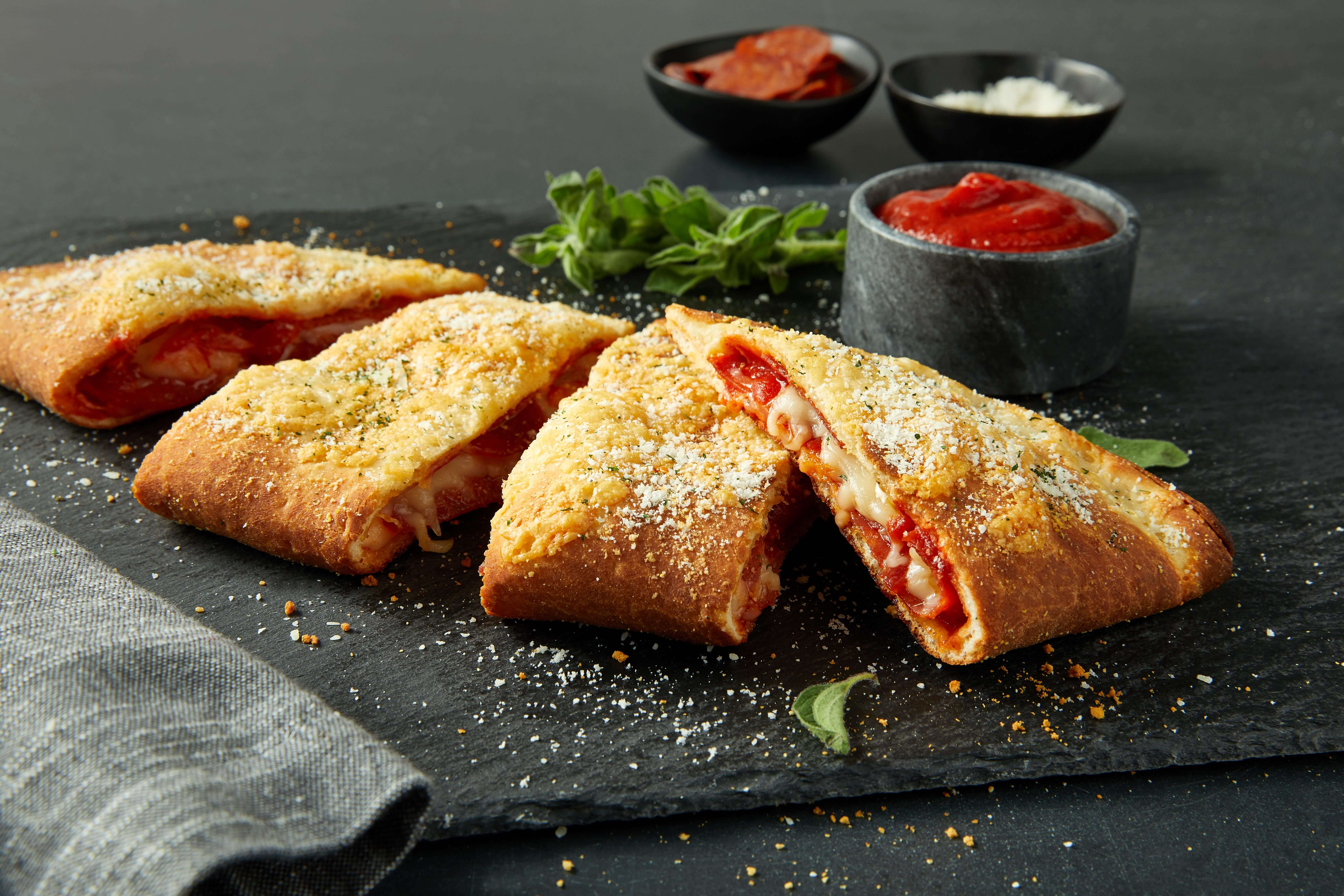 Order Pepperoni Calzone food online from Donatos Pizza store, Erie on bringmethat.com