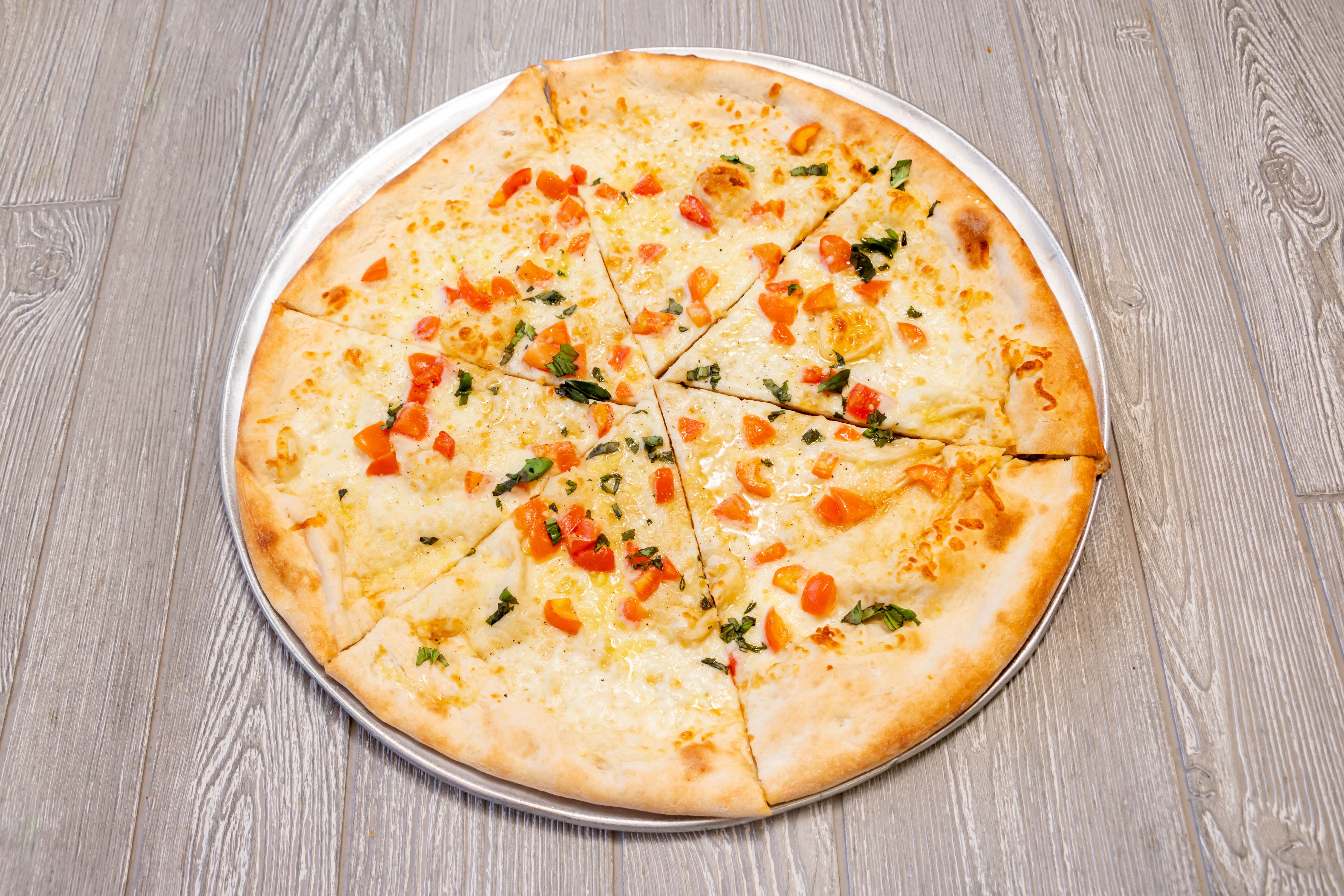 Order White Pizza with Sliced Tomatoes - Medium 14" food online from Gianni Pizza store, Wilmington on bringmethat.com