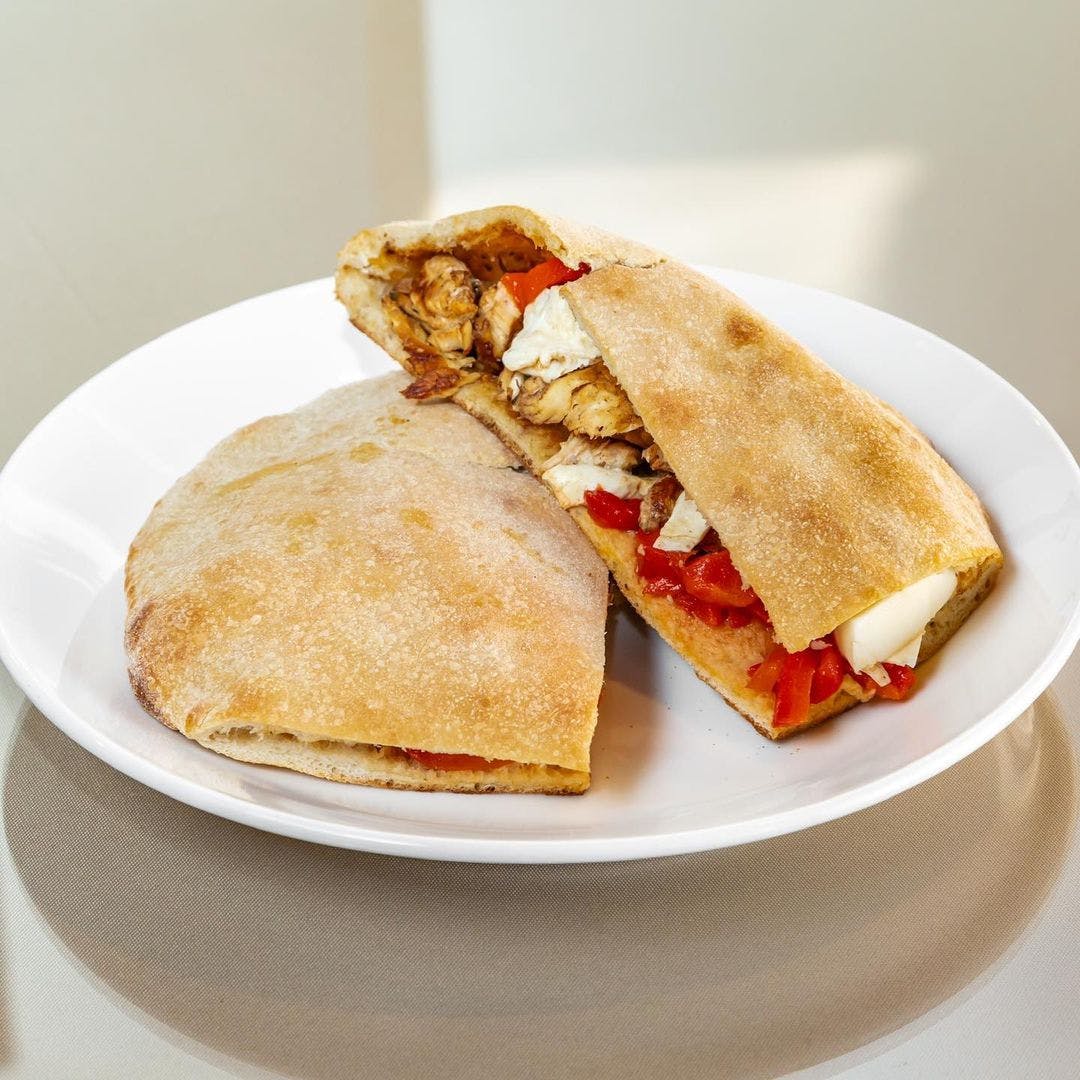 Order Grilled Chicken Pita - Pita food online from Dolce Pizzeria & Restaurant store, Fords on bringmethat.com