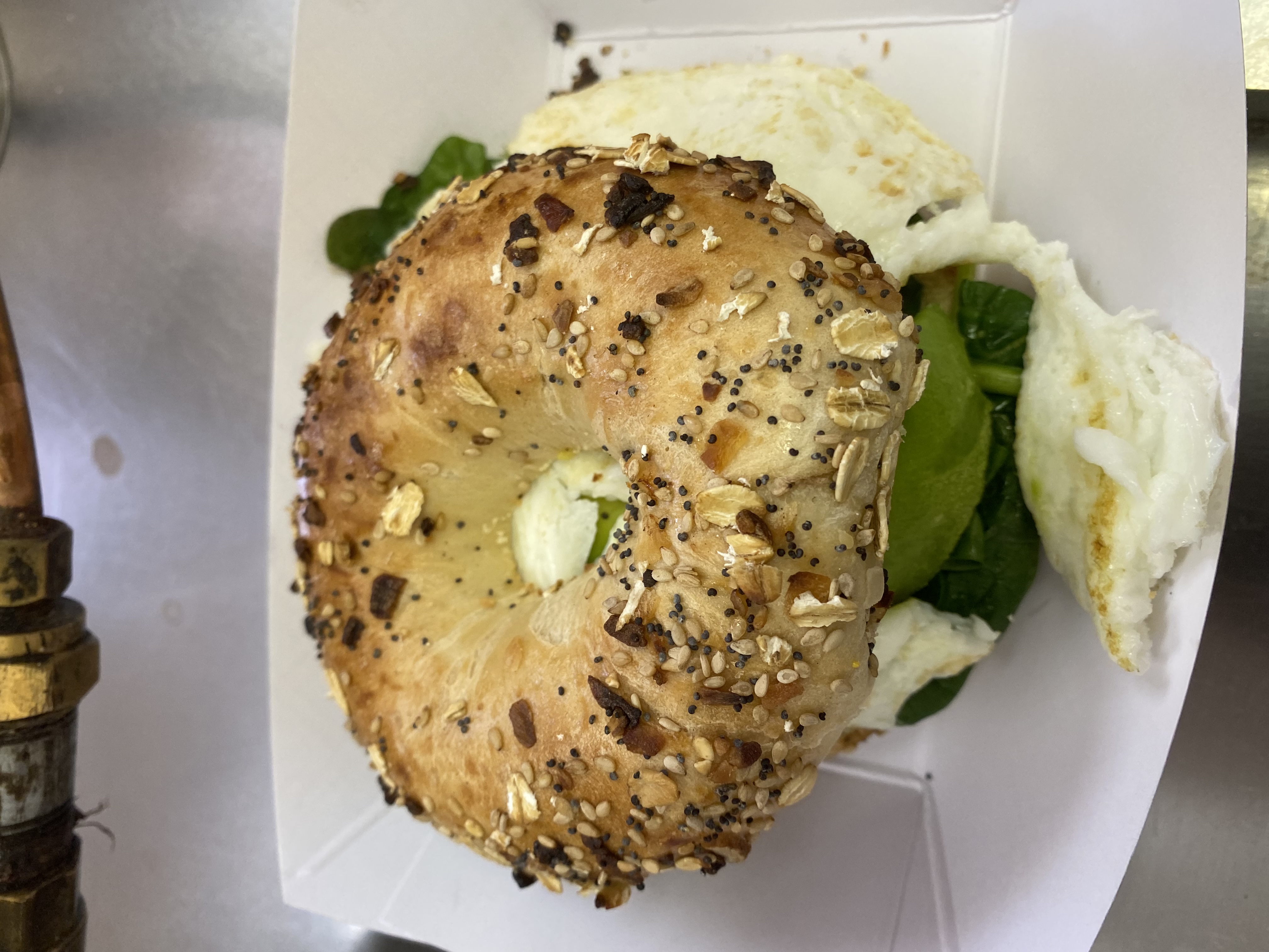 Order Egg white avocado & spinach  &cheese on A bagel food online from Jakes pup in the ruff store, Chicago on bringmethat.com