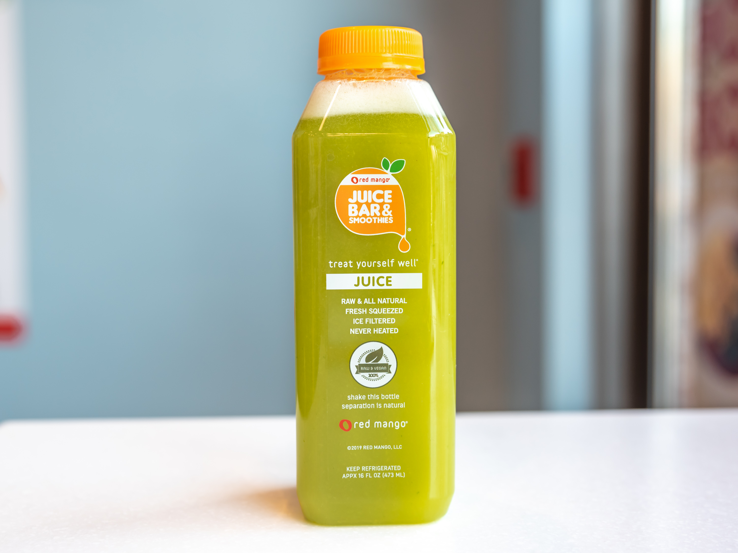 Order 16 oz. Tropical Detox Greens Juice food online from Red Mango store, Woodbridge on bringmethat.com