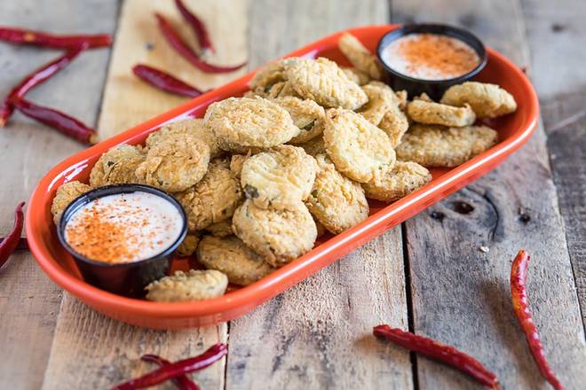Order FRIED PICKLES food online from Razzoo's store, Irving on bringmethat.com