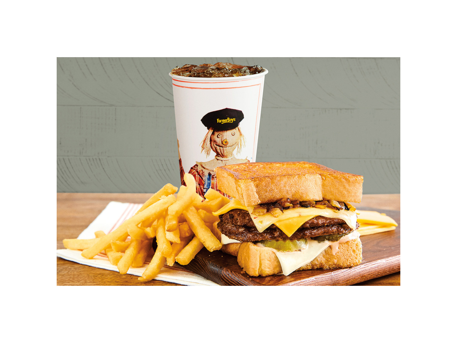 Order Cheesy Lover’s Burger Melt - Double Combo food online from Farmer Boys store, Las Vegas on bringmethat.com