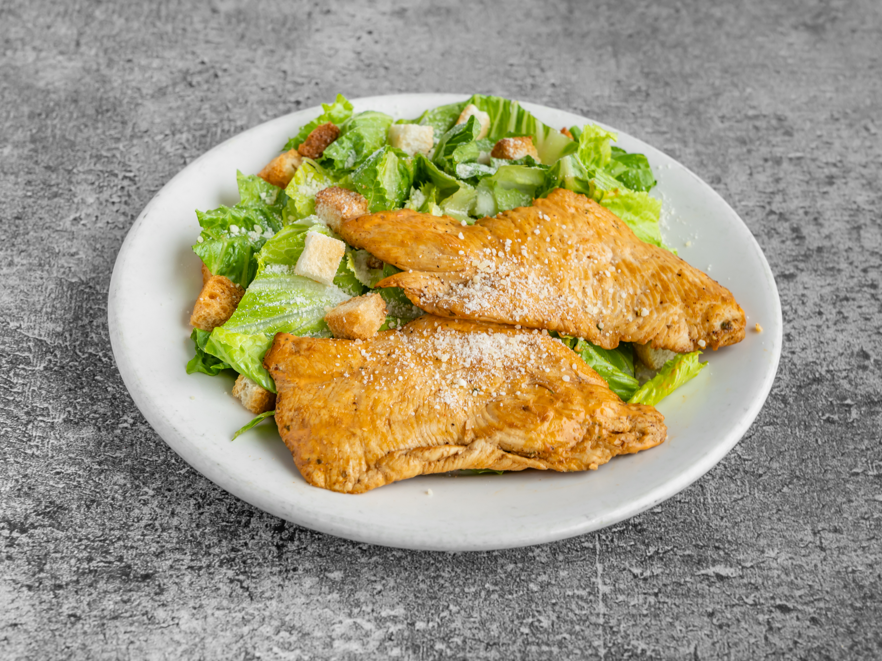 Order Caesar salad w/chicken (grilled or cutlet) food online from La Pizzeria Del Sabor store, Yonkers on bringmethat.com