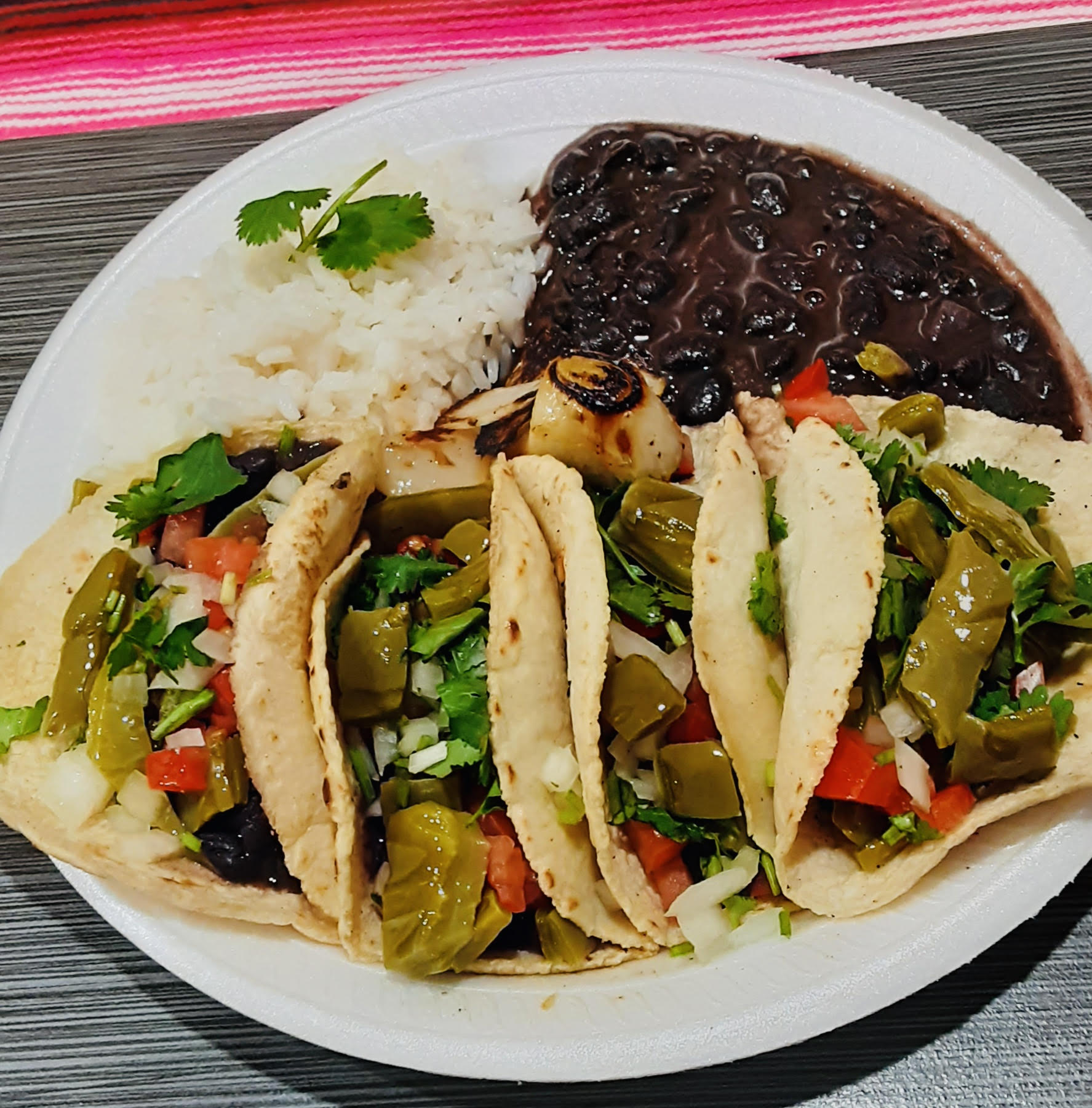 Order Azteca Vegan Tacos (4) con Arroz y Frijoles food online from Vegan Sabor store, Whittier on bringmethat.com