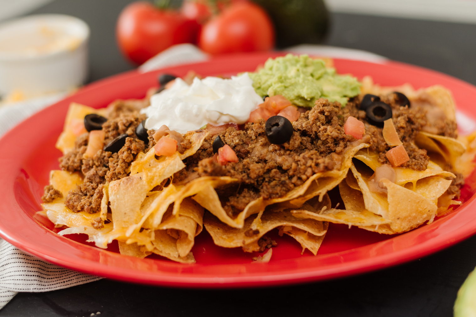Order Nacho Supreme food online from Su Casa Mexican Restaurant store, Midvale on bringmethat.com