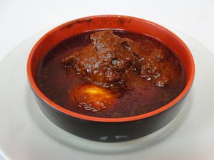 Order Doro Wot / Chicken Stew food online from Enatye Ethiopian Restaurant store, Herndon on bringmethat.com
