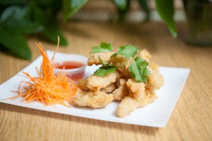 Order 5. Fried Calamari food online from Thai Wok-In & Go store, Dallas on bringmethat.com