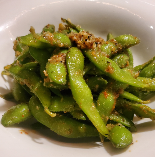 Order Garlic Edamame food online from Iron Fish Sushi & Grill store, Pflugerville on bringmethat.com