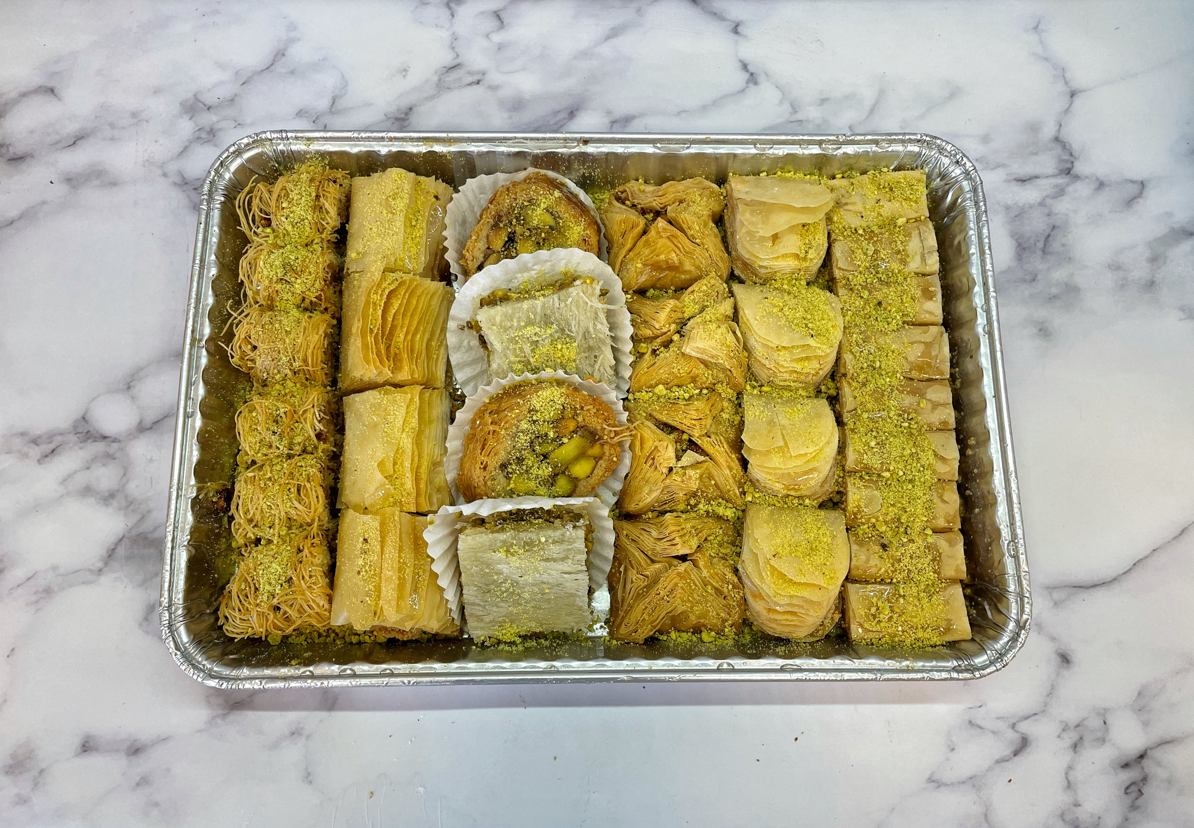 Order Assorted Mixed Baklava Extra (Quarter Sheet) food online from Sarkis Pastry store, Pasadena on bringmethat.com