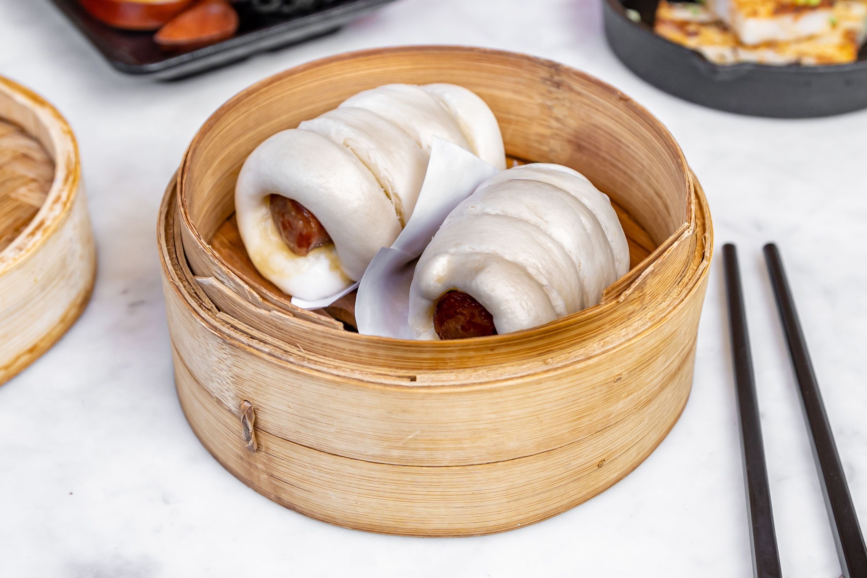 Order Steamed Chinese Sausage Wrap Bao food online from Iron Teapot Dim Sum store, Los Angeles on bringmethat.com