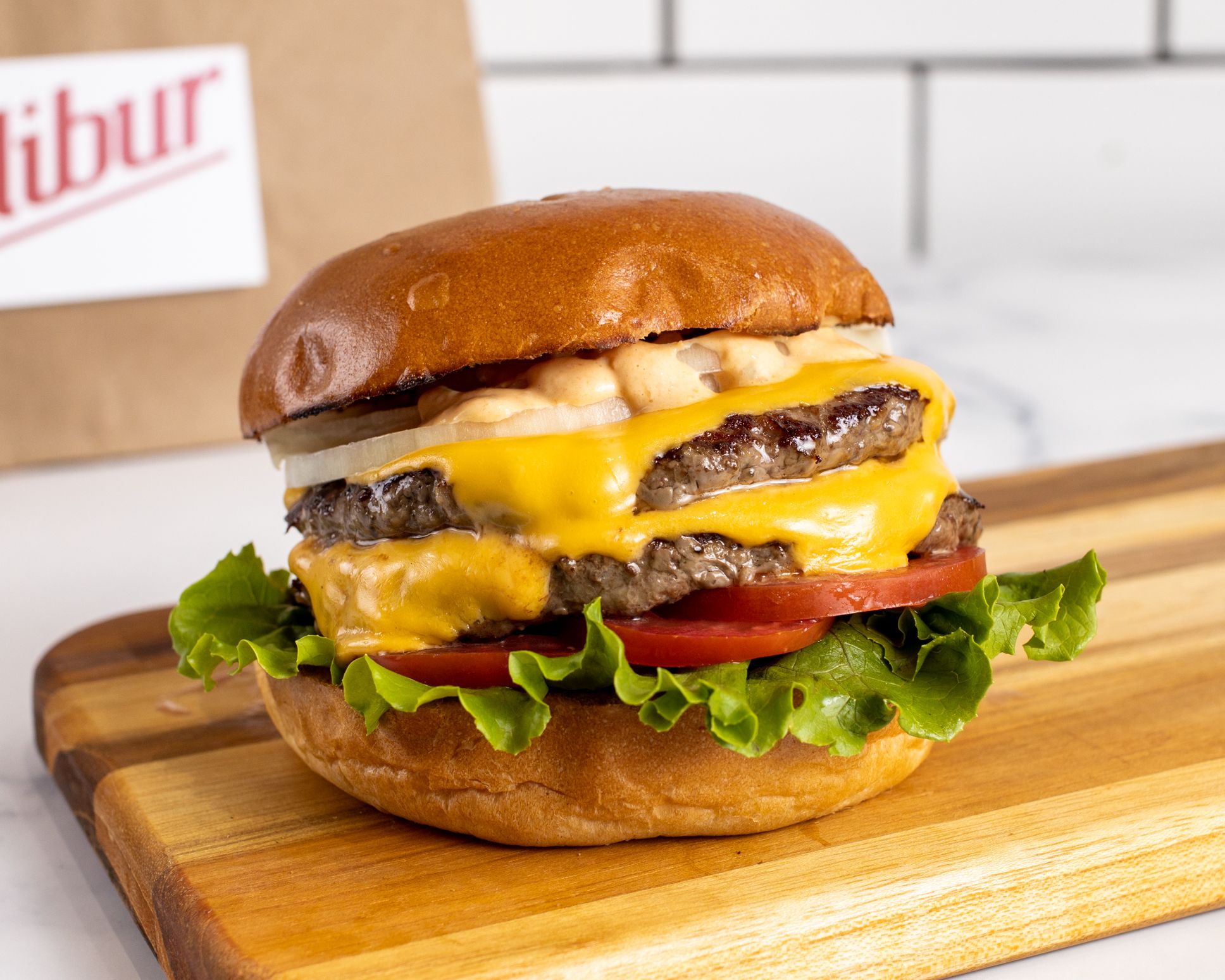 Order Double Cheeseburger food online from Calibur Express store, San Francisco on bringmethat.com