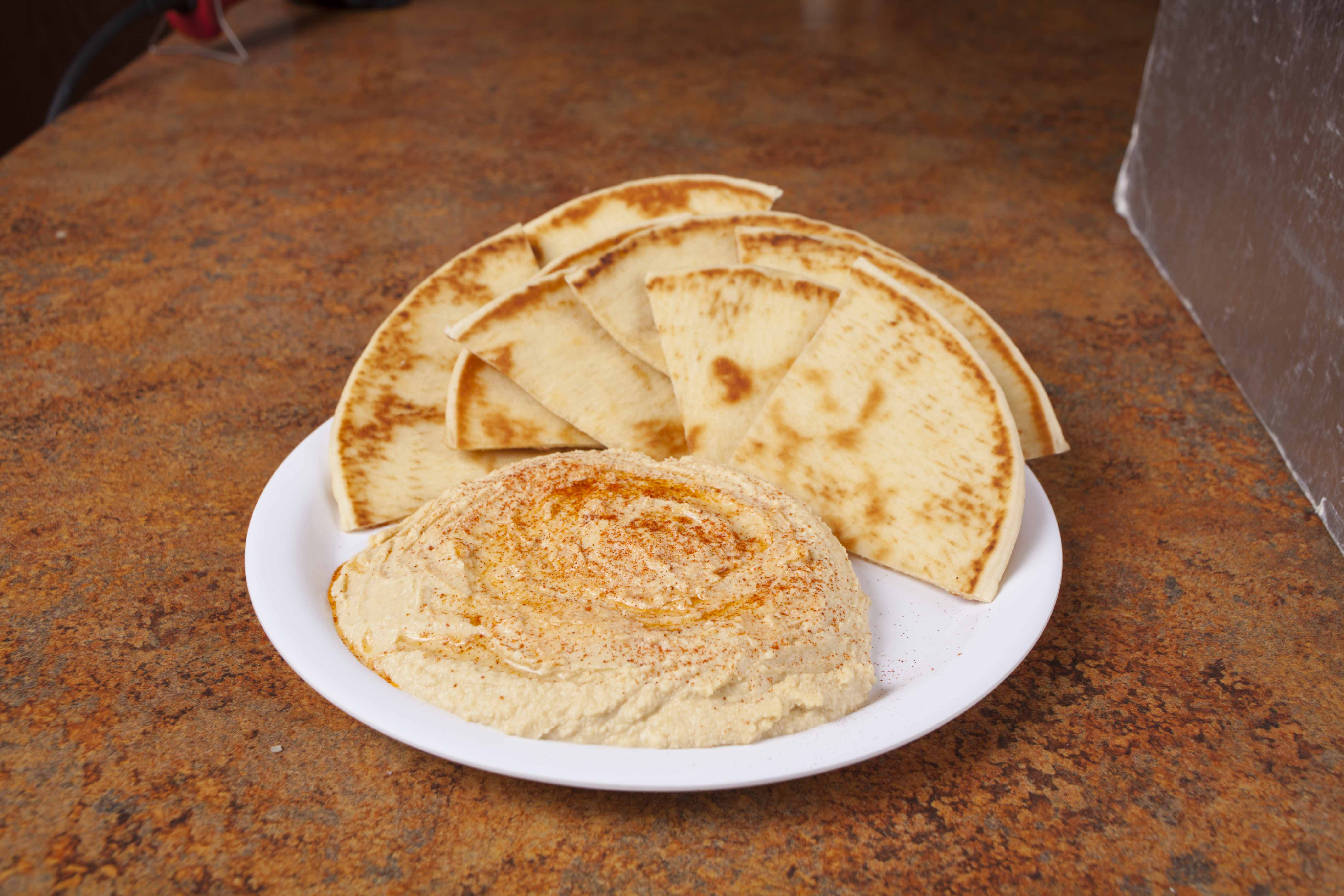Order Hummus with 2 Pitas food online from Greek Chicken store, El Cajon on bringmethat.com