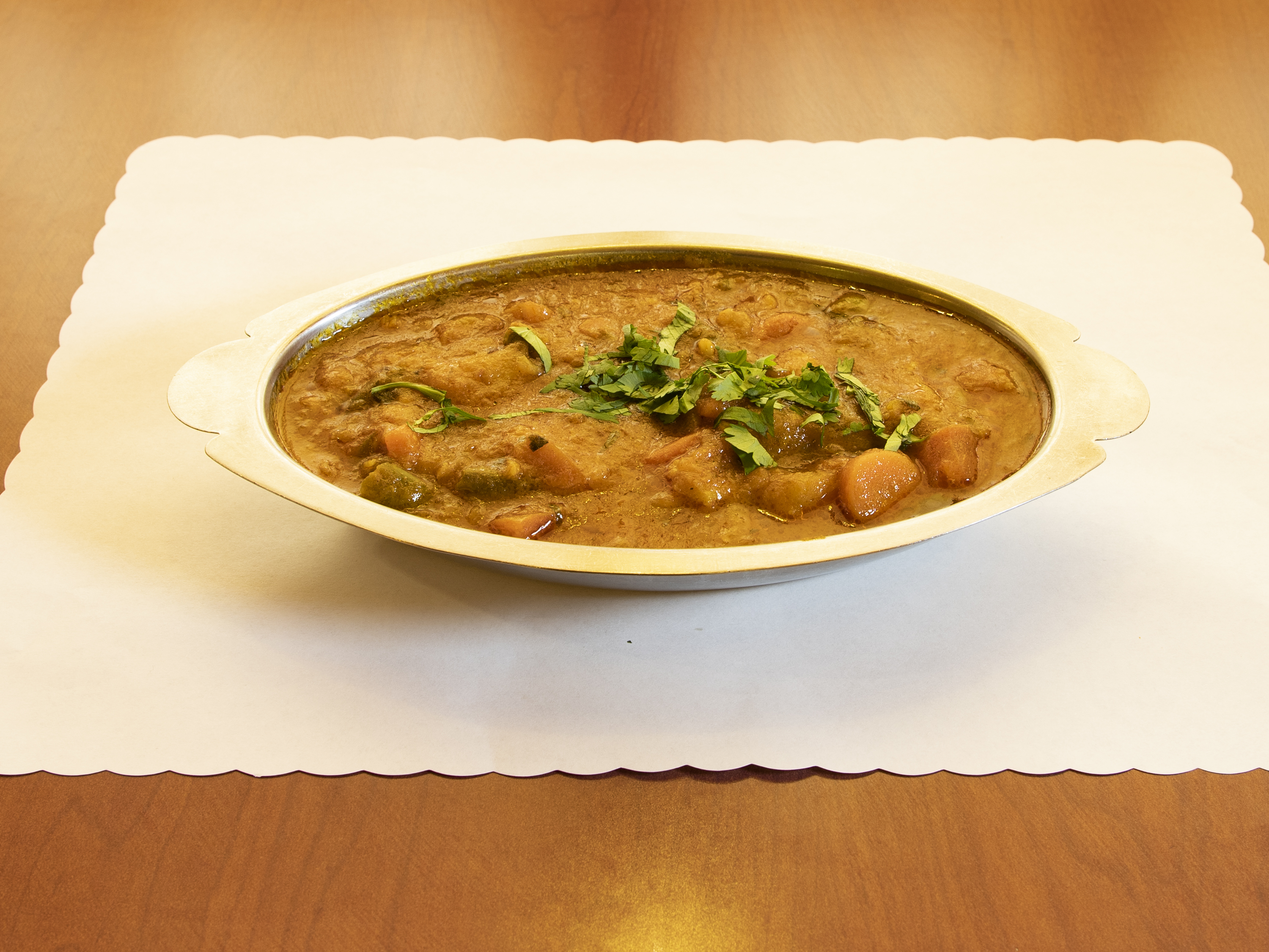 Order Vegetable Curry food online from Taste of India store, Layton on bringmethat.com