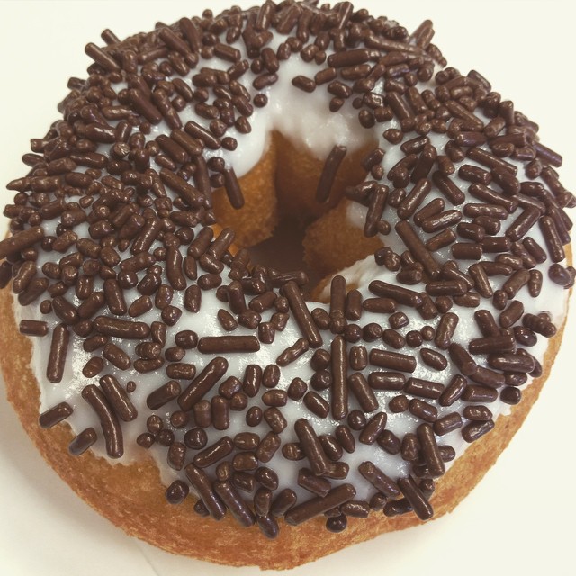 Order Black and White Donut food online from Desert Donuts store, Phoenix on bringmethat.com