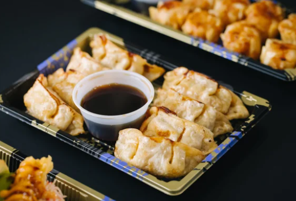 Order Chicken Pot Stickers food online from Sushi Dojo store, Southlake on bringmethat.com