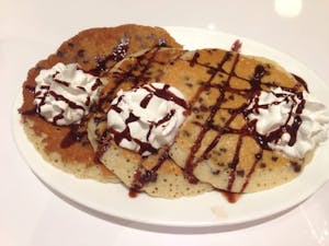 Order Chocolate Chip Pancakes food online from Cafe 50's (west la) store, Los Angeles on bringmethat.com
