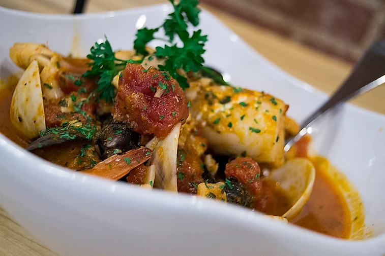 Order Cioppino food online from Molto Bene Italian Eatery store, Lakewood on bringmethat.com