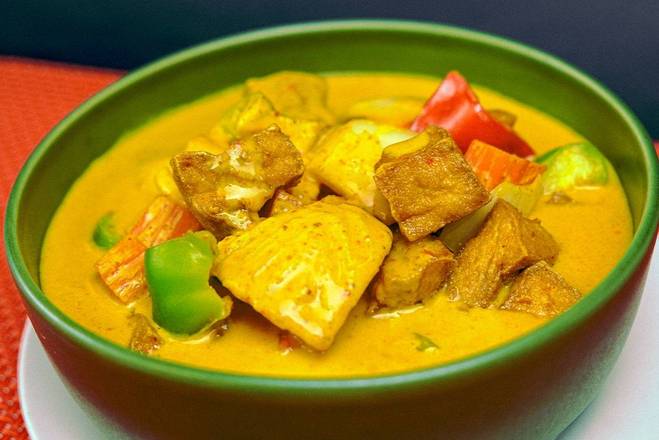 Order Yellow Curry food online from Blue Orchid Thai Bistro store, Palm Desert on bringmethat.com