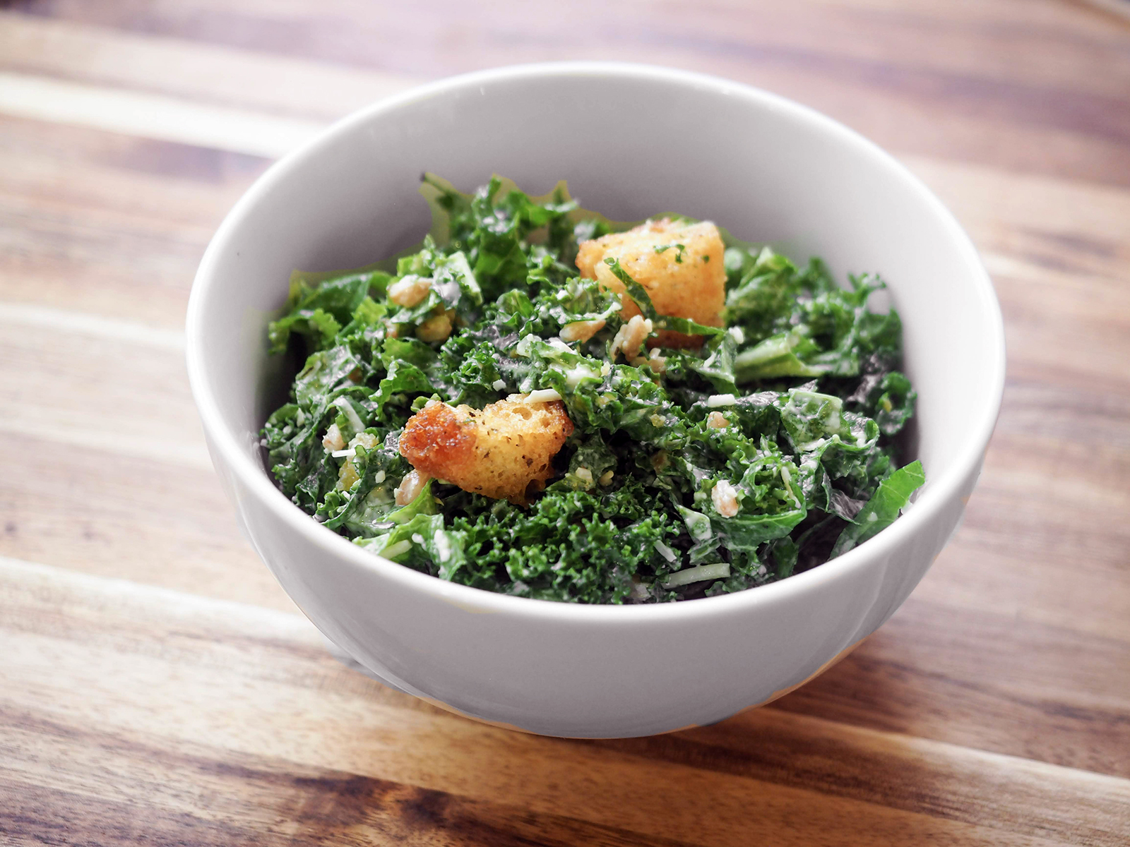 Order Kale Caesar Salad with Farro food online from Market Hall Foods store, Berkeley on bringmethat.com