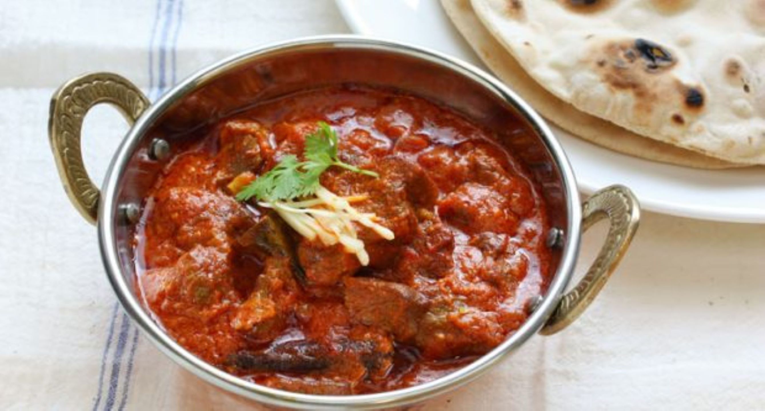 Order Lamb Balti food online from The indian kitchen store, West Hollywood on bringmethat.com