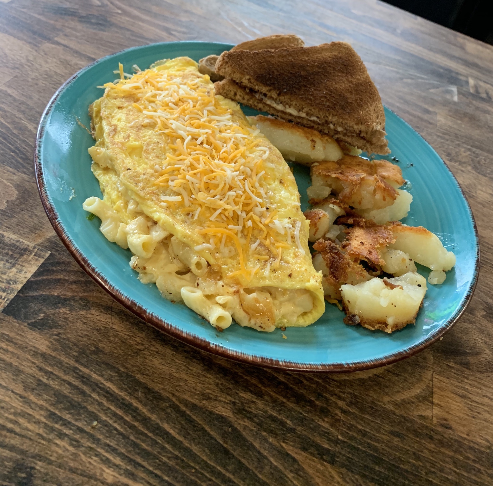 Order Mac & cheese omelette food online from Cappa Trackside Kitchen store, Melrose on bringmethat.com