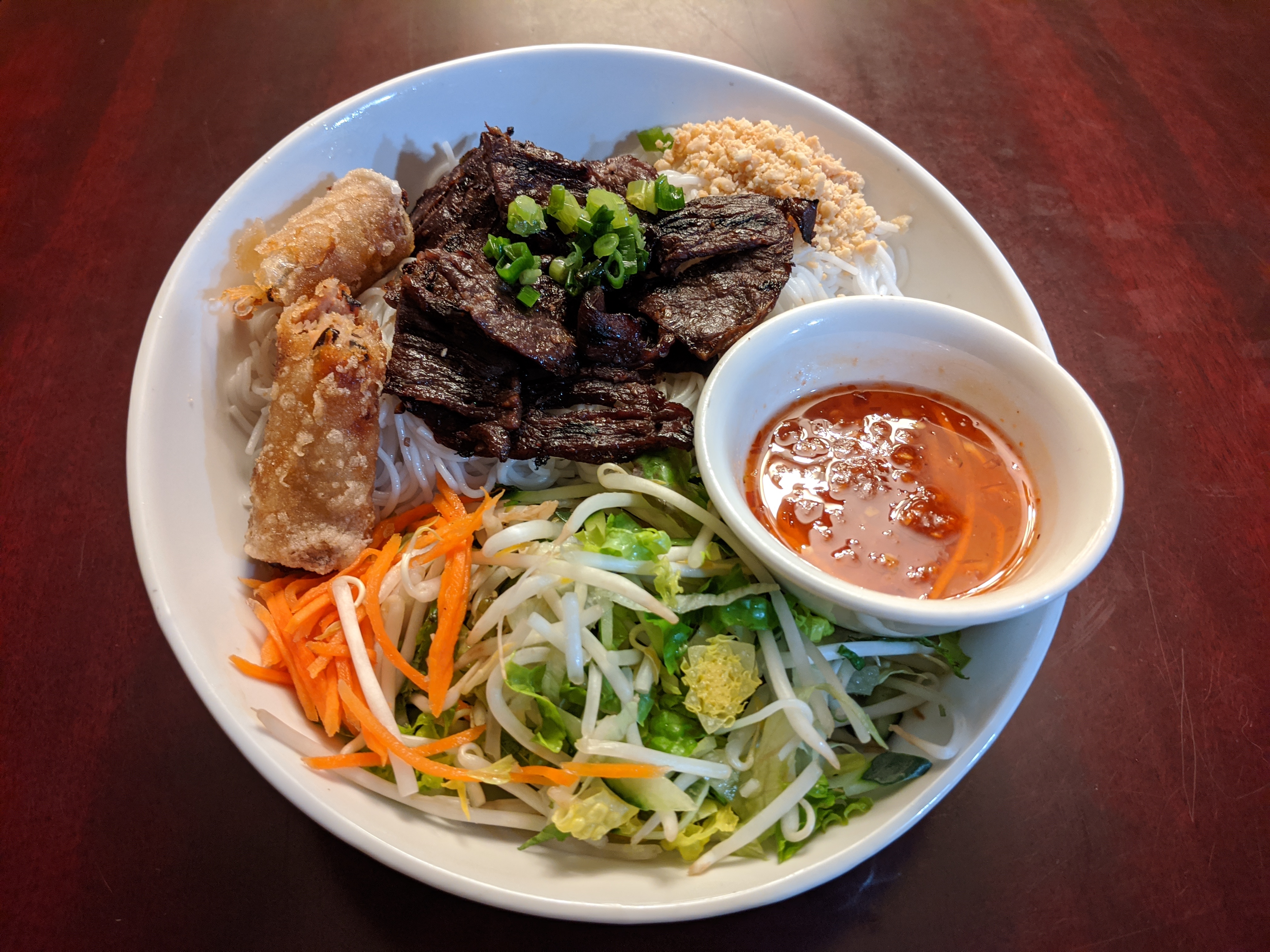 Order B6. Vermicelli with Grilled Beef and Fried Egg Rolls food online from Bac Lieu Restaurant store, San Francisco on bringmethat.com