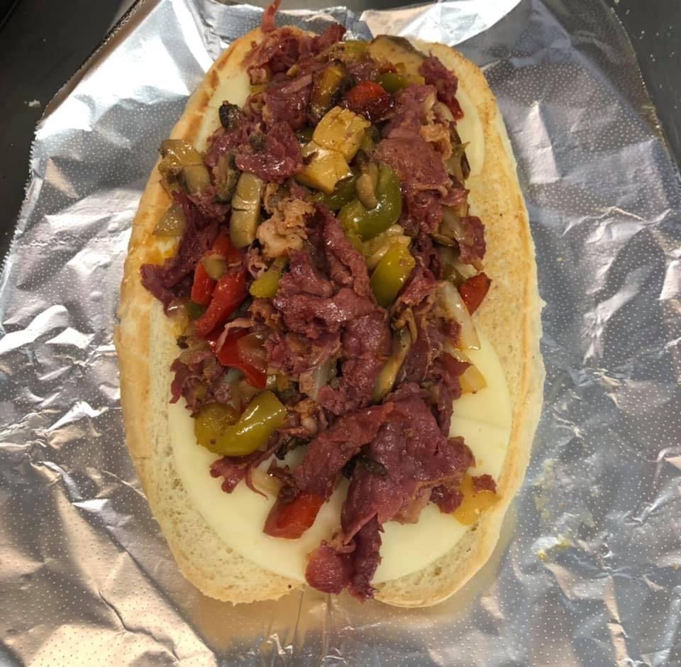 Order Pastrami Bomb Sub - Small food online from Phillip's Roast Beef & Pizza store, Rowley on bringmethat.com