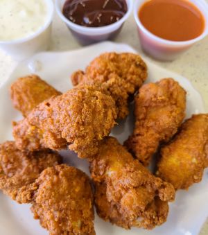 Order 8 Hot Wings food online from Charo Chicken store, Huntington Beach on bringmethat.com
