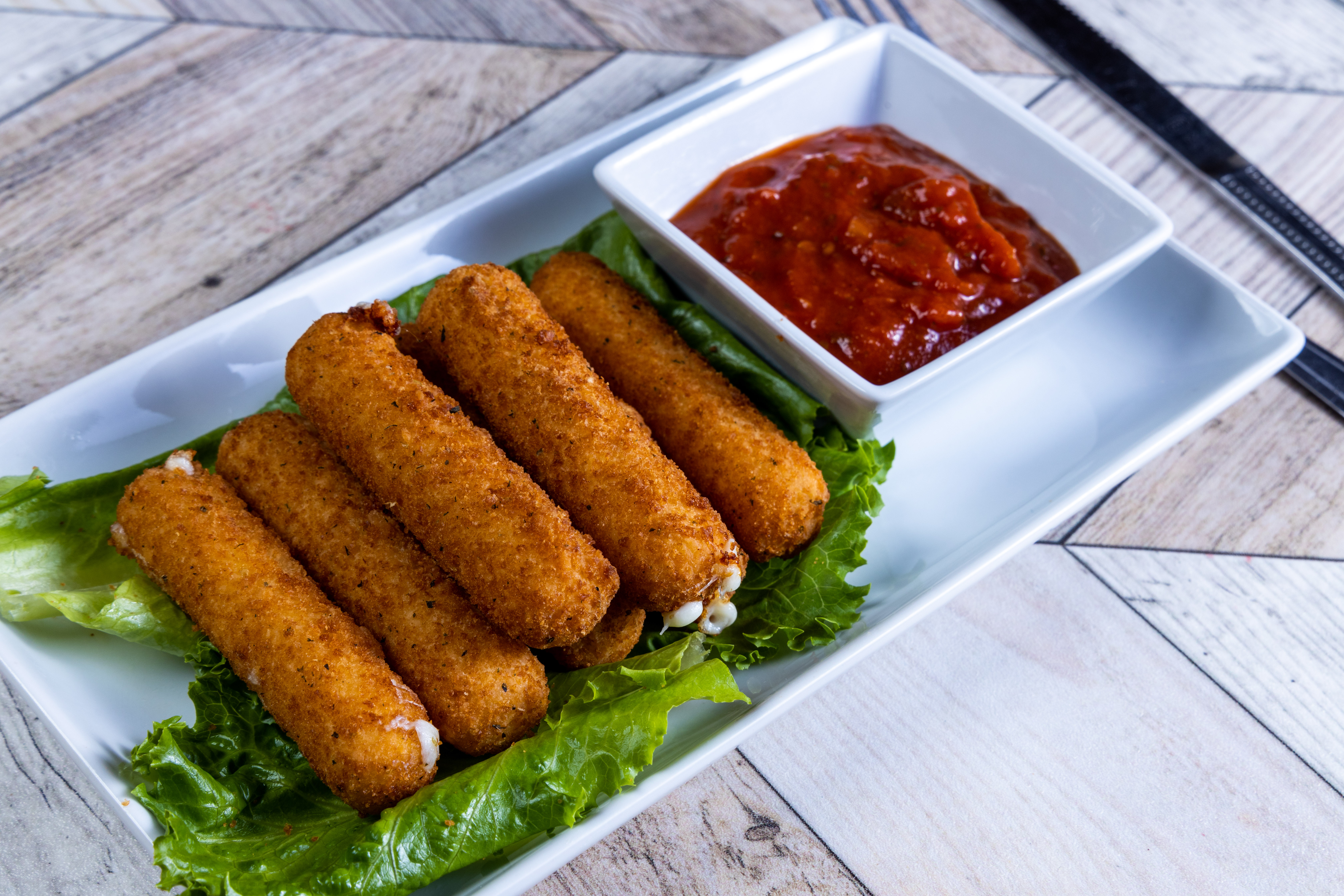 Order Mozzarella Cheese Sticks (7) food online from Top View Restaurant store, Chicago on bringmethat.com
