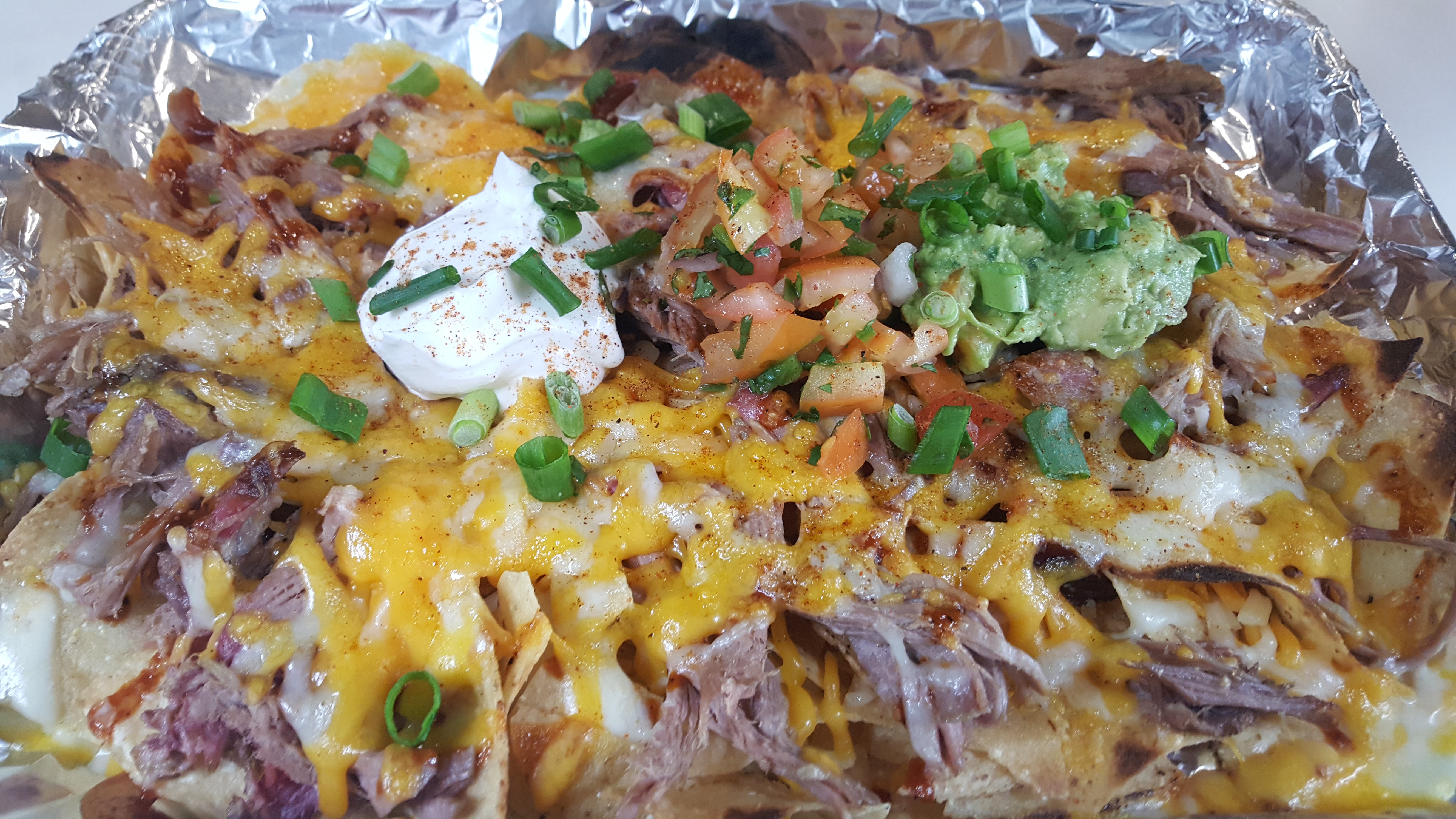 Order Pulled Pork Nachos food online from Bodacious Pig Barbecue store, Eagle on bringmethat.com