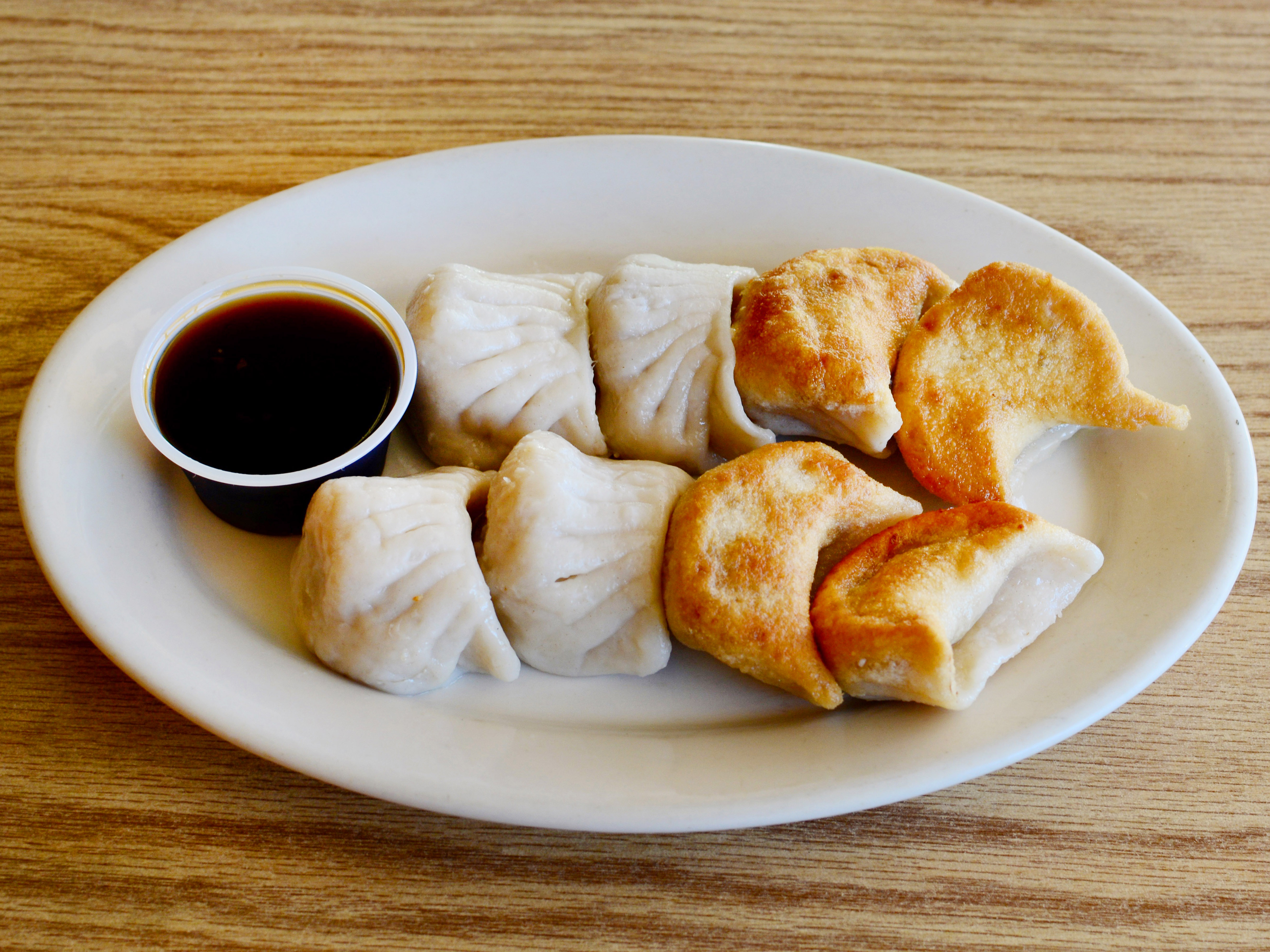 Order Dumplings (6) food online from Panda Bowl Restaurant store, Arlington on bringmethat.com