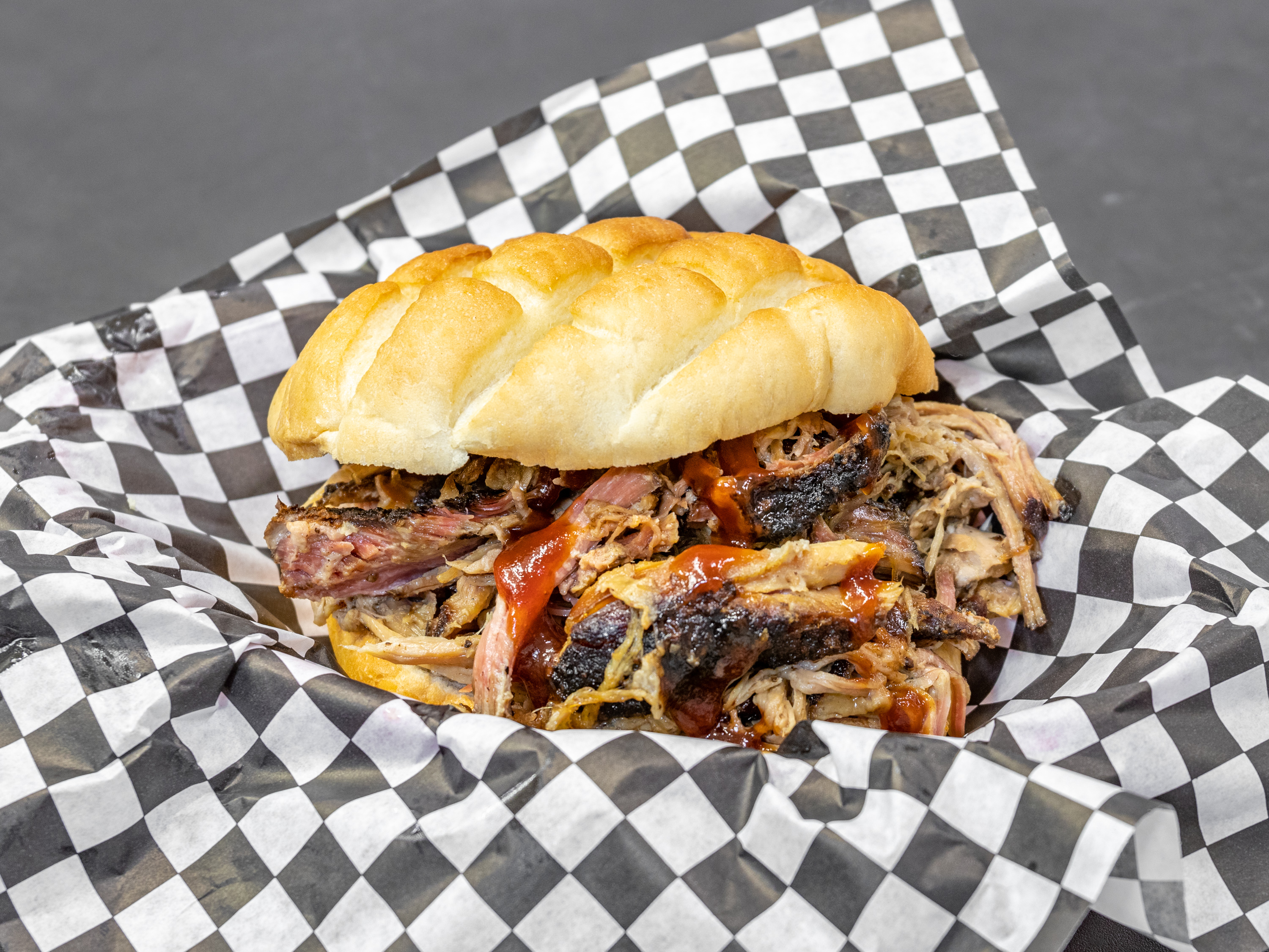 Order Pulled Pork Sandwich food online from Boss's Slow Smoked BBQ store, Las Vegas on bringmethat.com