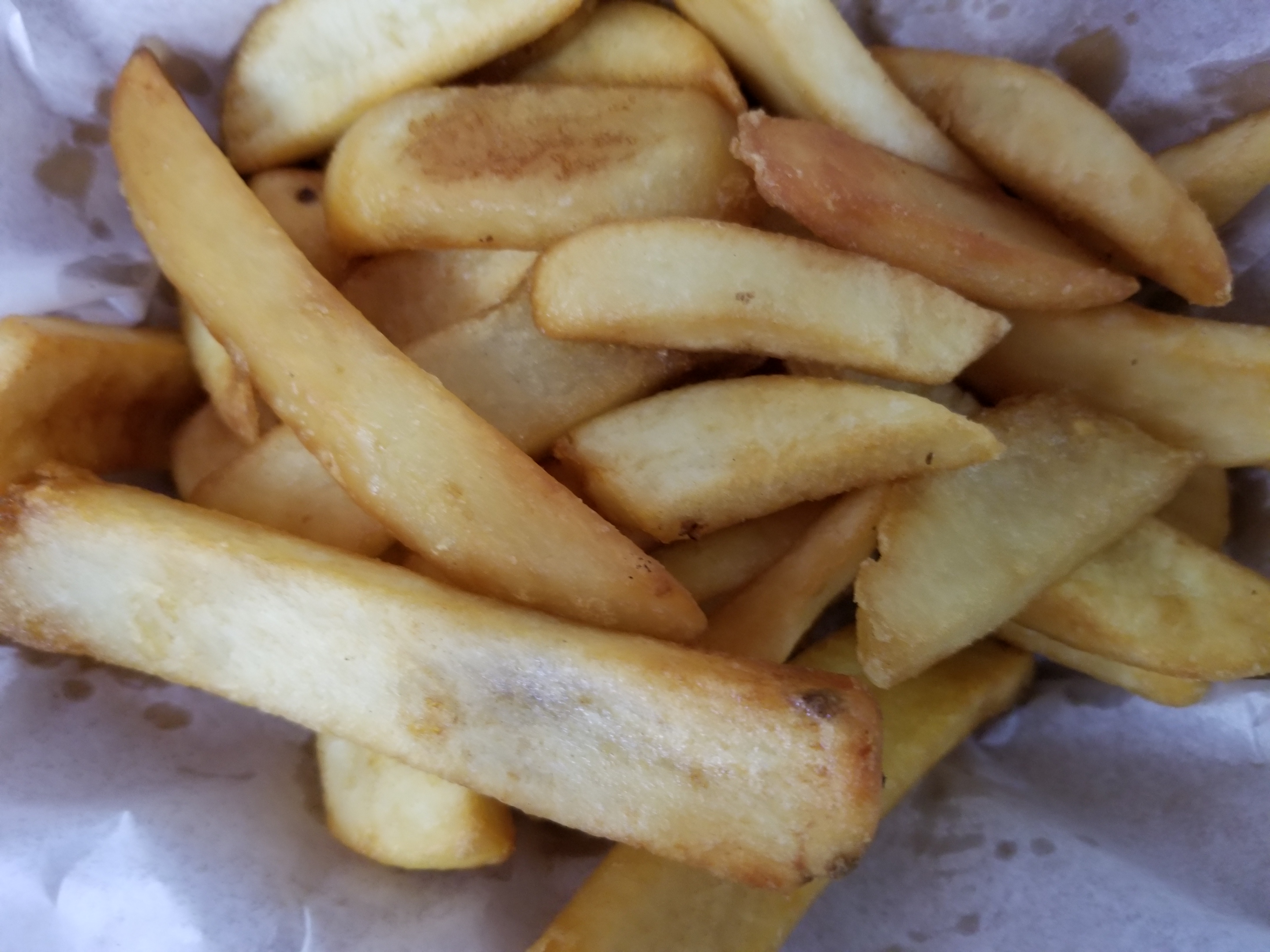 Order French Fries food online from Blakes BBQ & Burgers Blake store, Houston on bringmethat.com