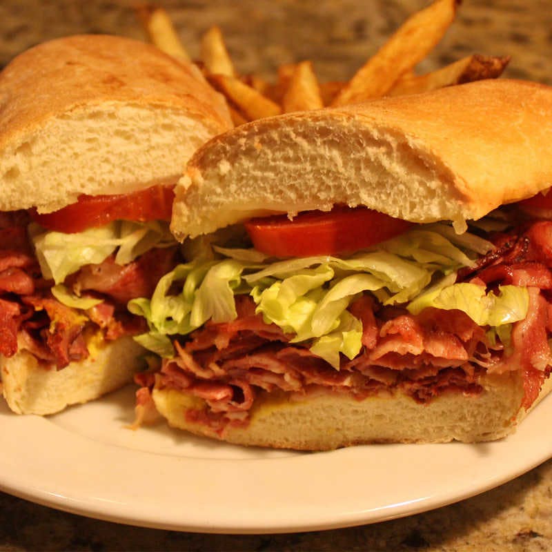 Order Pastrami Sandwich - Sandwich food online from Straw Hat Pizza Grille store, Milpitas on bringmethat.com