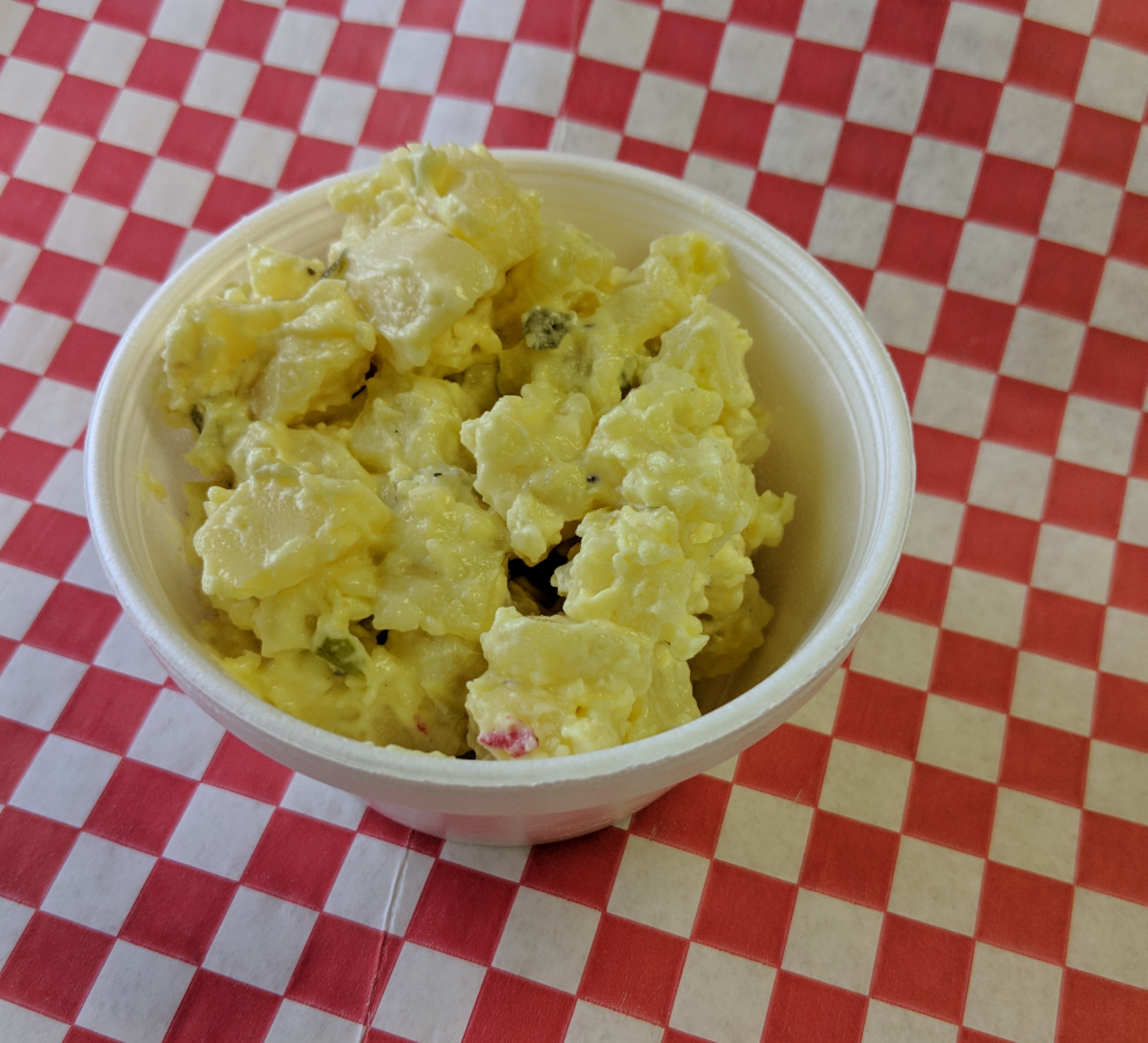 Order Potato Salad food online from Marco Polo Cheesesteaks store, New Braunfels on bringmethat.com