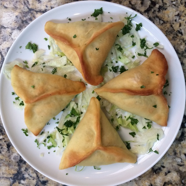 Order 4 Piece Spinach Pies food online from Micho'z Fresh Lebanese Grill store, San Diego on bringmethat.com