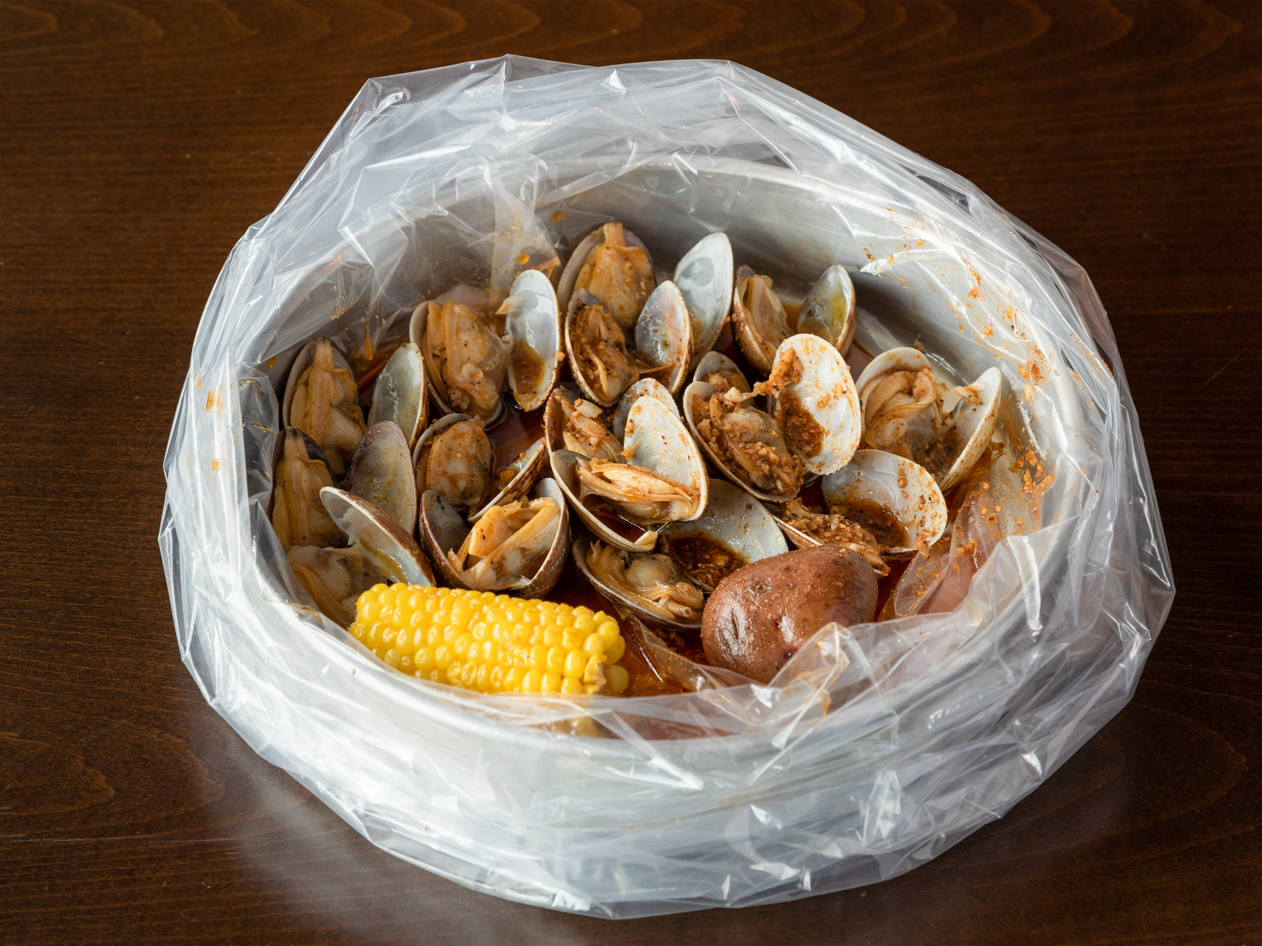 Order Baby Clam food online from Shaking Seafood store, Roslindale on bringmethat.com
