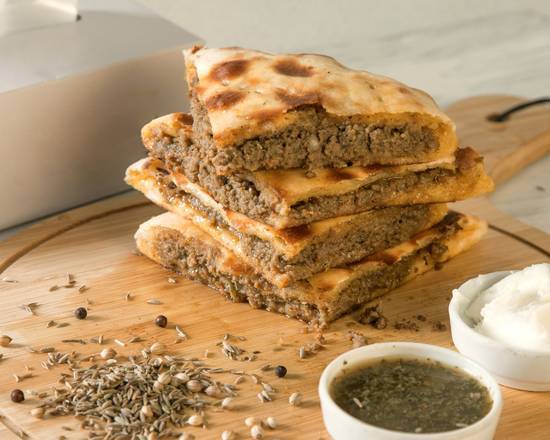 Order Lamb & Cheese Naan food online from Aroma Indian Restaurant store, Bloomington on bringmethat.com
