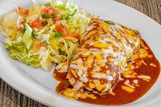 Order Tamale w/ Sauce* food online from Caramba store, Glendale on bringmethat.com