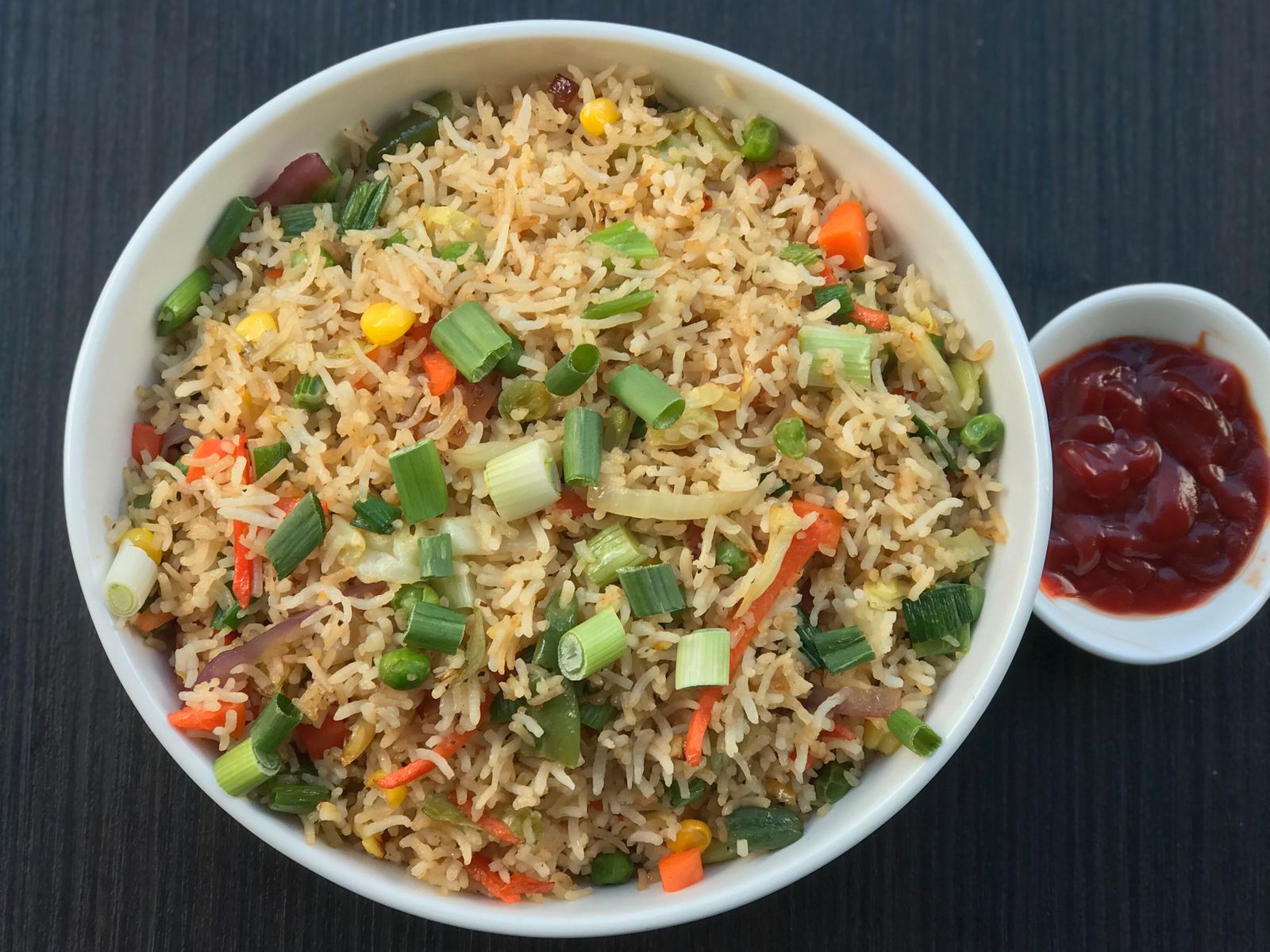 Order Vegetable Fried Rice food online from Mirchi Indian Kitchen store, Foster City on bringmethat.com