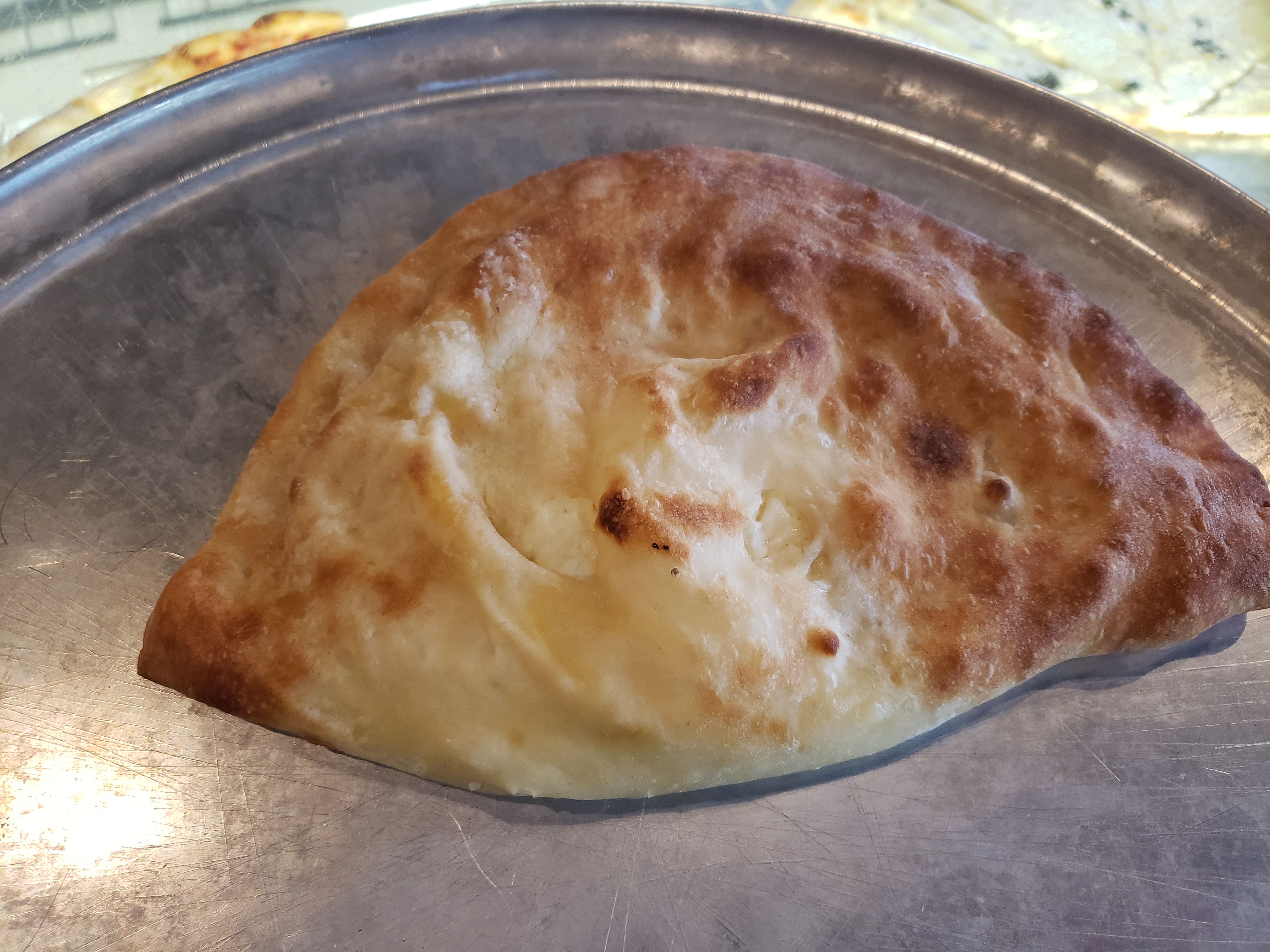 Order Cheese Calzone food online from Ian and JoJo's Pizzeria & Restaurant store, Waynesville on bringmethat.com