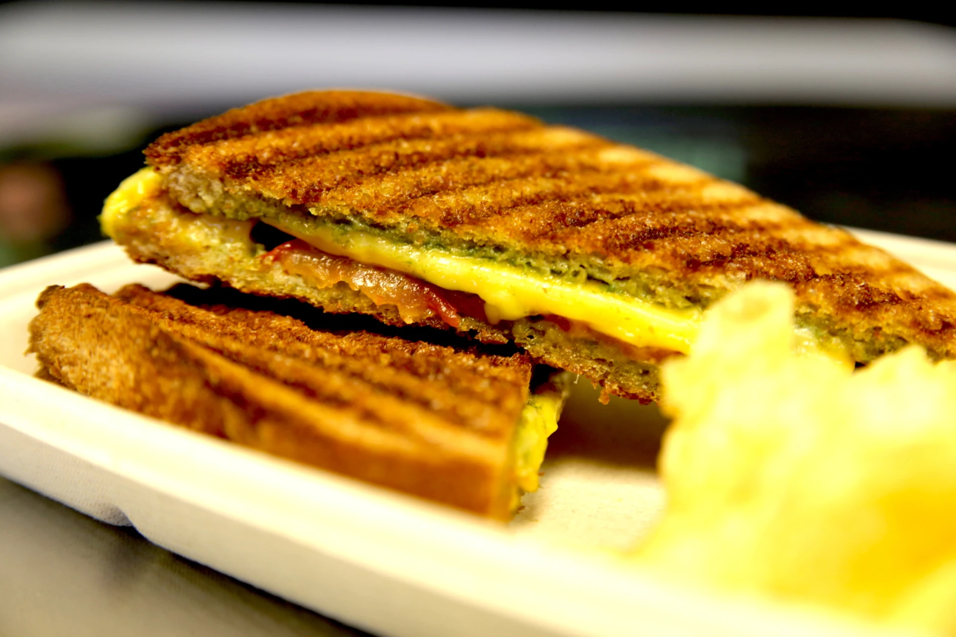 Order Grilled Cheese Panini with Pesto and Tomato food online from Simply Pure by Chef Stacey store, Las Vegas on bringmethat.com