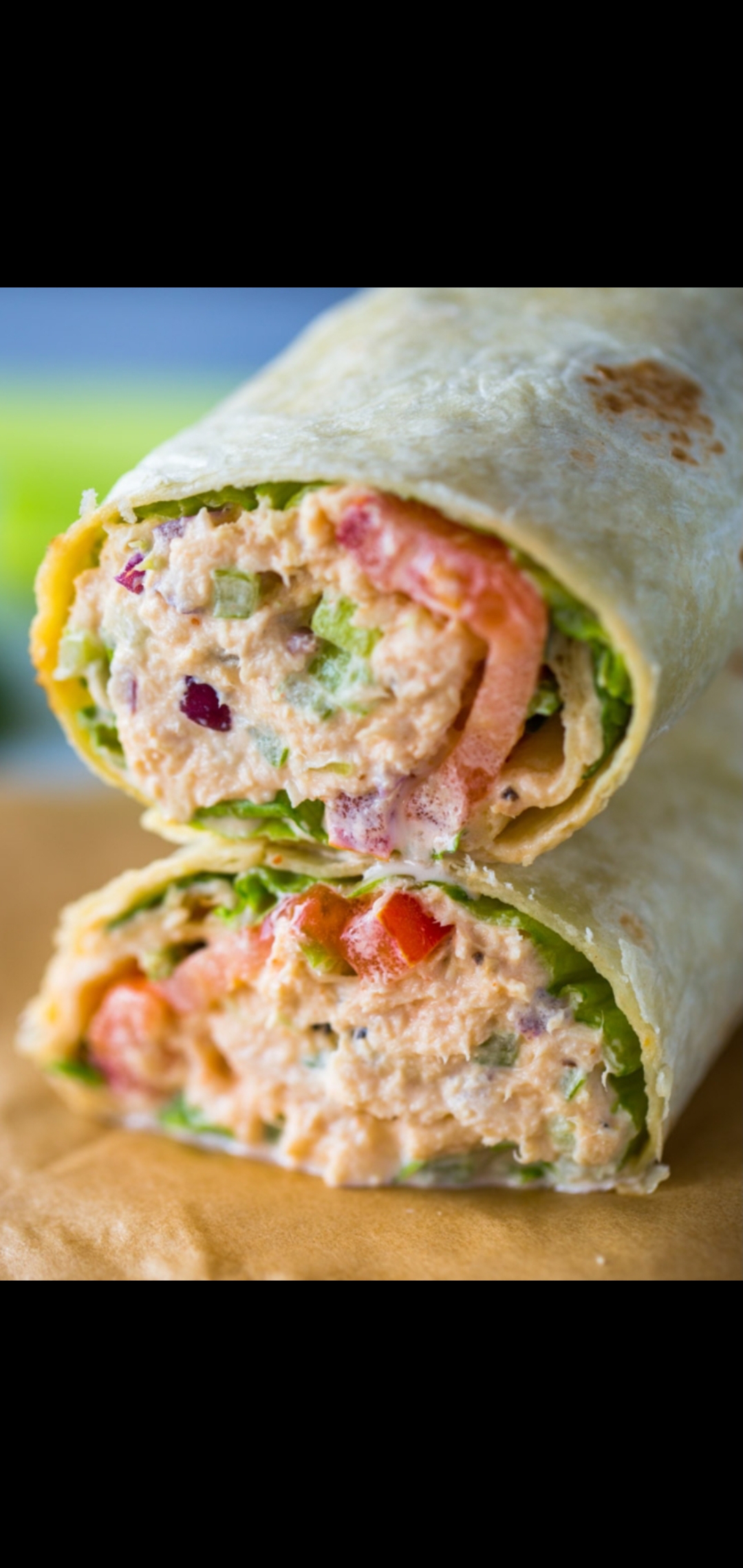 Order Classic Spicy Tuna Melt Wrap (spicy tuna salad pepper  jack cheese salsa verde tomatoes lettuce jalapeños) food online from American Gourmet Foods Deli store, New York on bringmethat.com