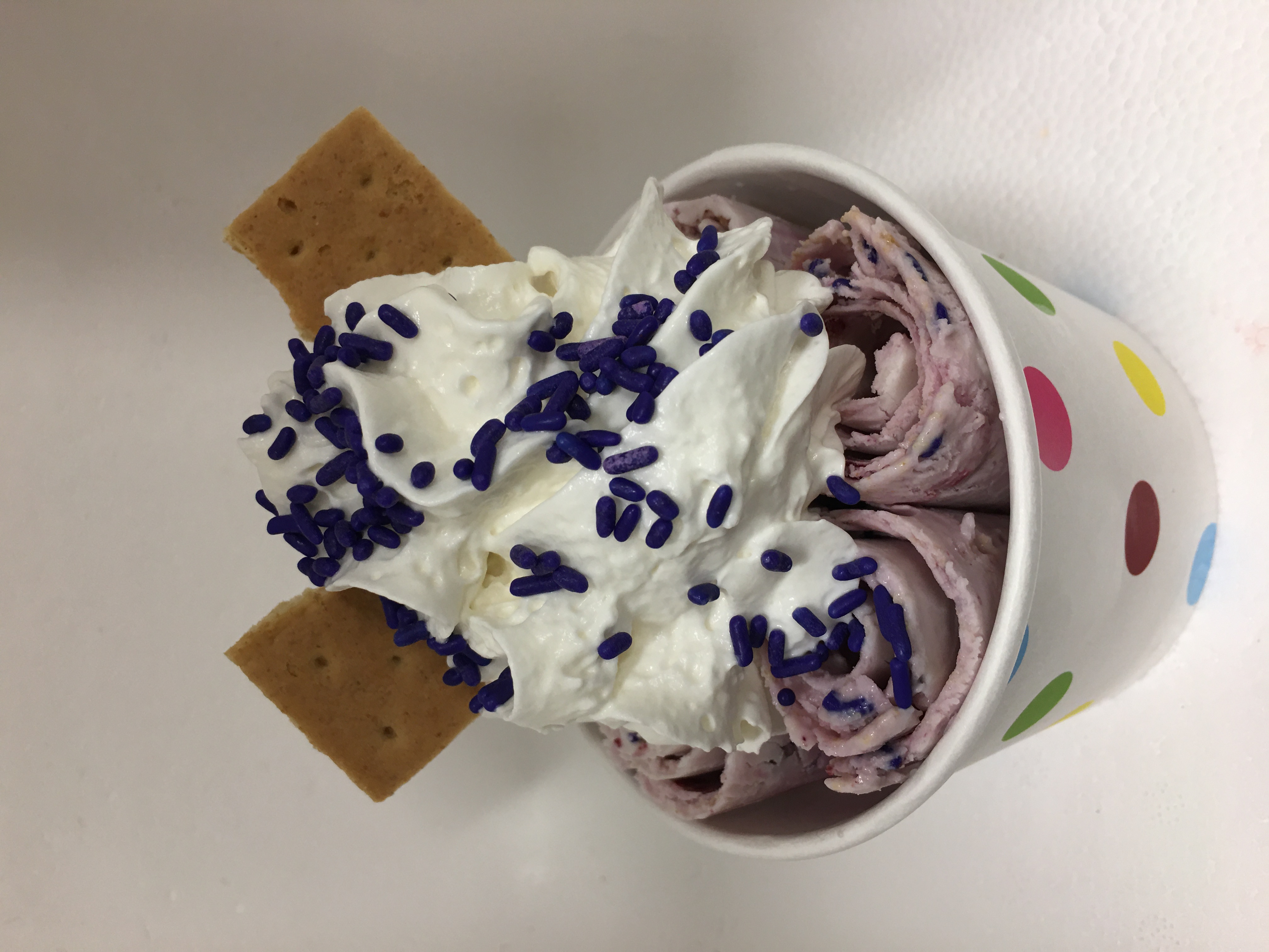 Order 20. Purple Rain Rolled Ice Cream food online from Pandora Rolled Ice Cream store, Manhattan on bringmethat.com