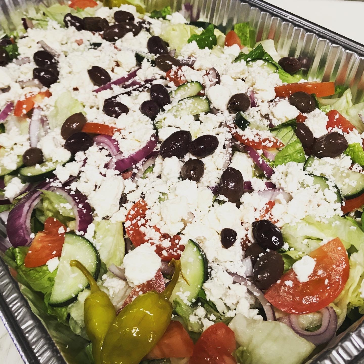 Order Greek Salad | Full Tray food online from Boston Pizza store, Las Vegas on bringmethat.com