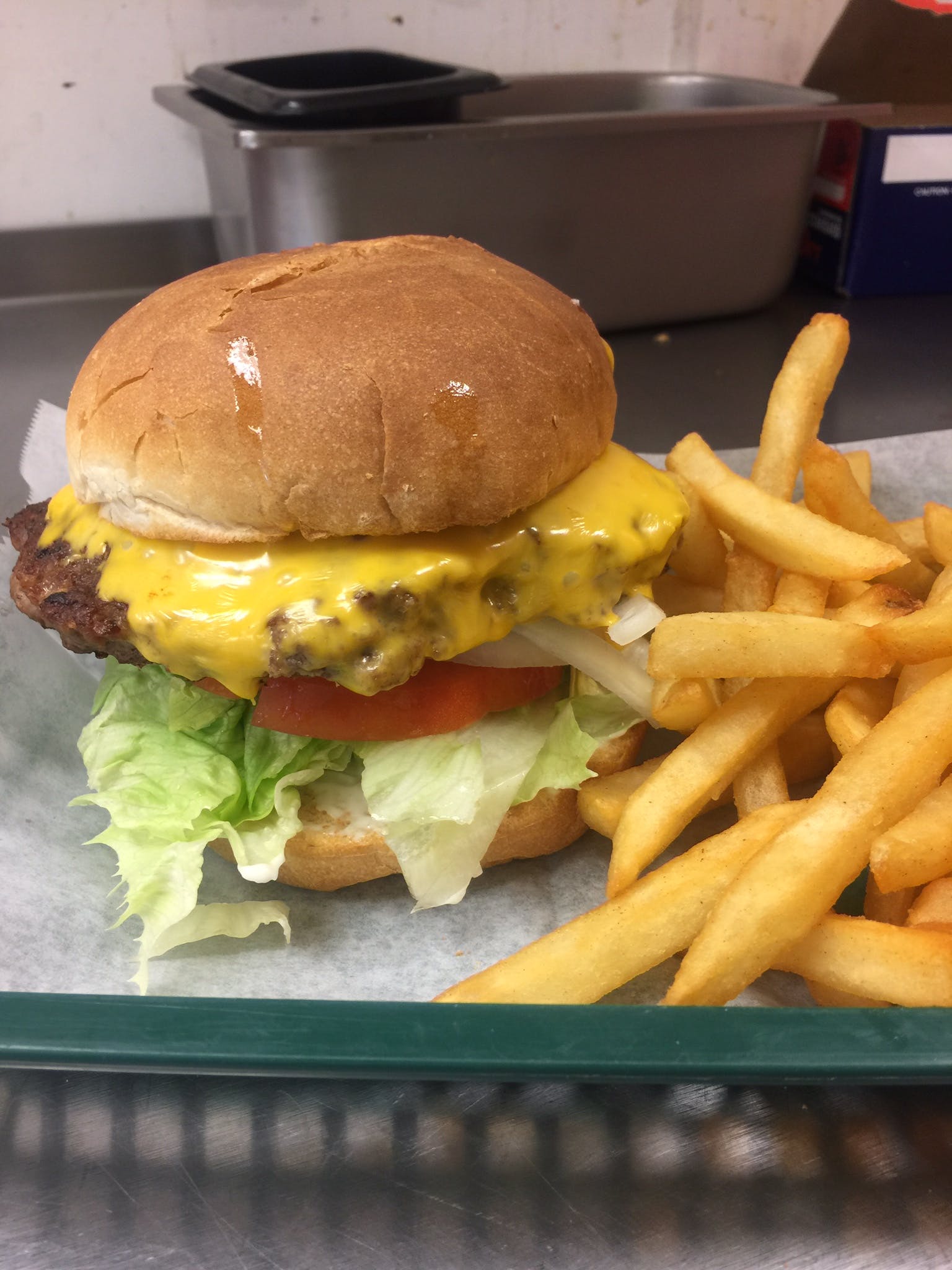 Order Cheeseburger with French Fries - 1/2 lb. food online from Big Guy Italiano Family Restaurant store, Bristol on bringmethat.com
