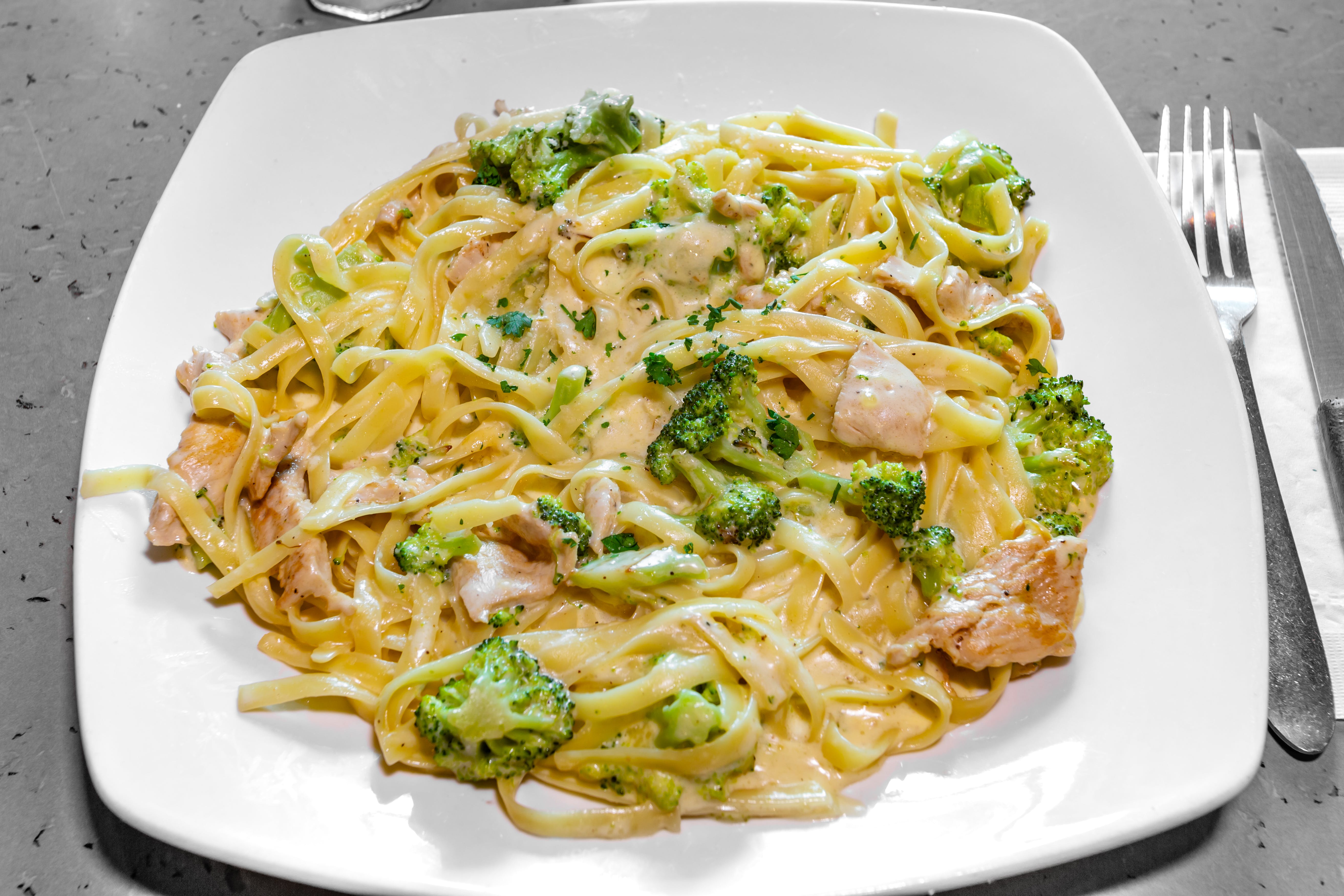 Order Chicken & Broccoli Alfredo Pasta - Pasta food online from Nino Italian Restaurant store, Reading on bringmethat.com