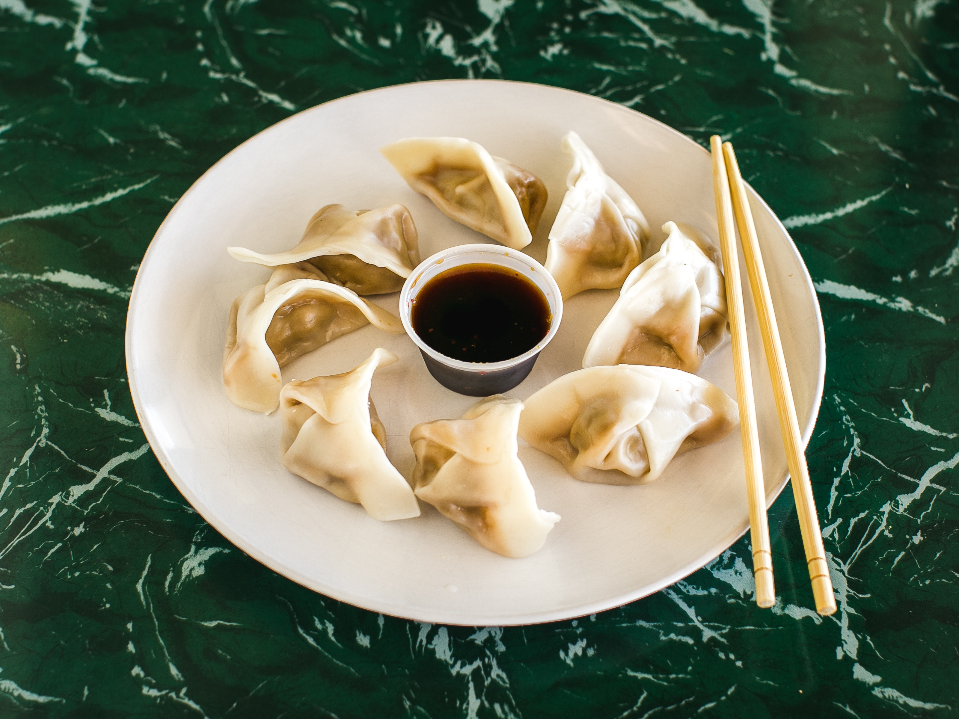 Order 8. Steamed Dumpling food online from No. 1 China store, Clifton Heights on bringmethat.com