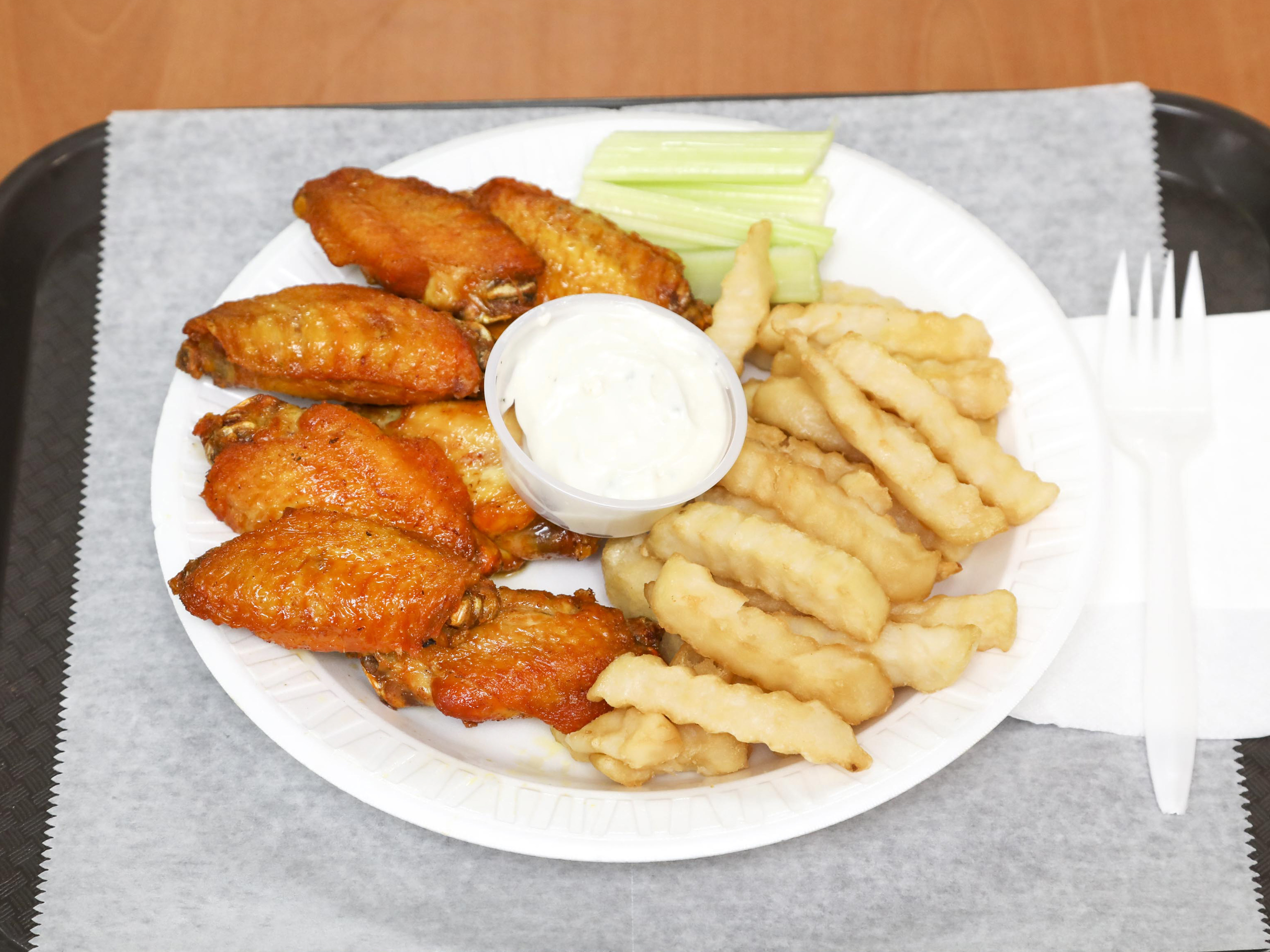 Order K6. 8 Piece Buffalo Chicken Wings with French Fries food online from Happy fresh tortillas store, Brooklyn on bringmethat.com